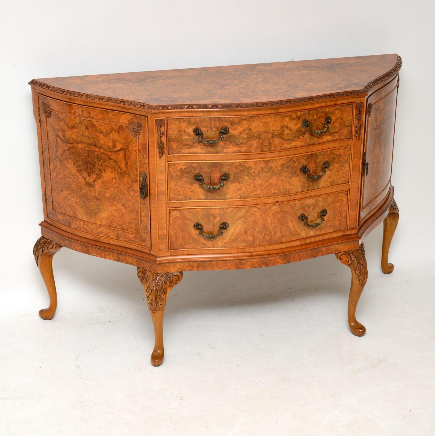 This antique burr walnut sideboard is extremely high quality and is in excellent condition, having just been French polished. Its Queen Anne style and dates to circa 1930s period. The burr walnut patterns are magnificent all-over and it’s