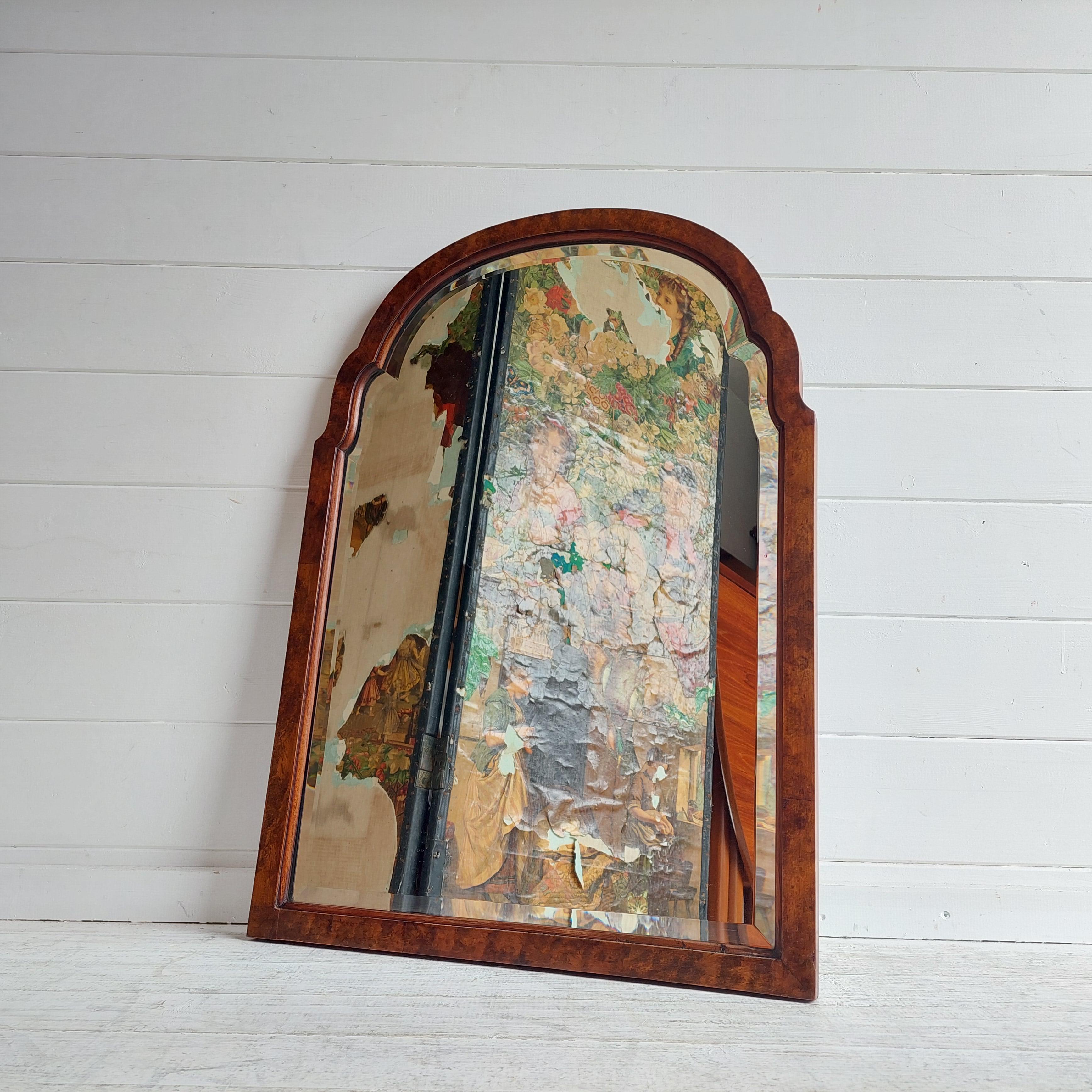 High quality Queen Anne from 19th century English Burr Walnut archtop overmantel mirror.
Arched beveled mirror plate set in a conforming burl walnut frame.
Portrait mirror
It comes with its original beveled glass and wood paneled back.
Antique 