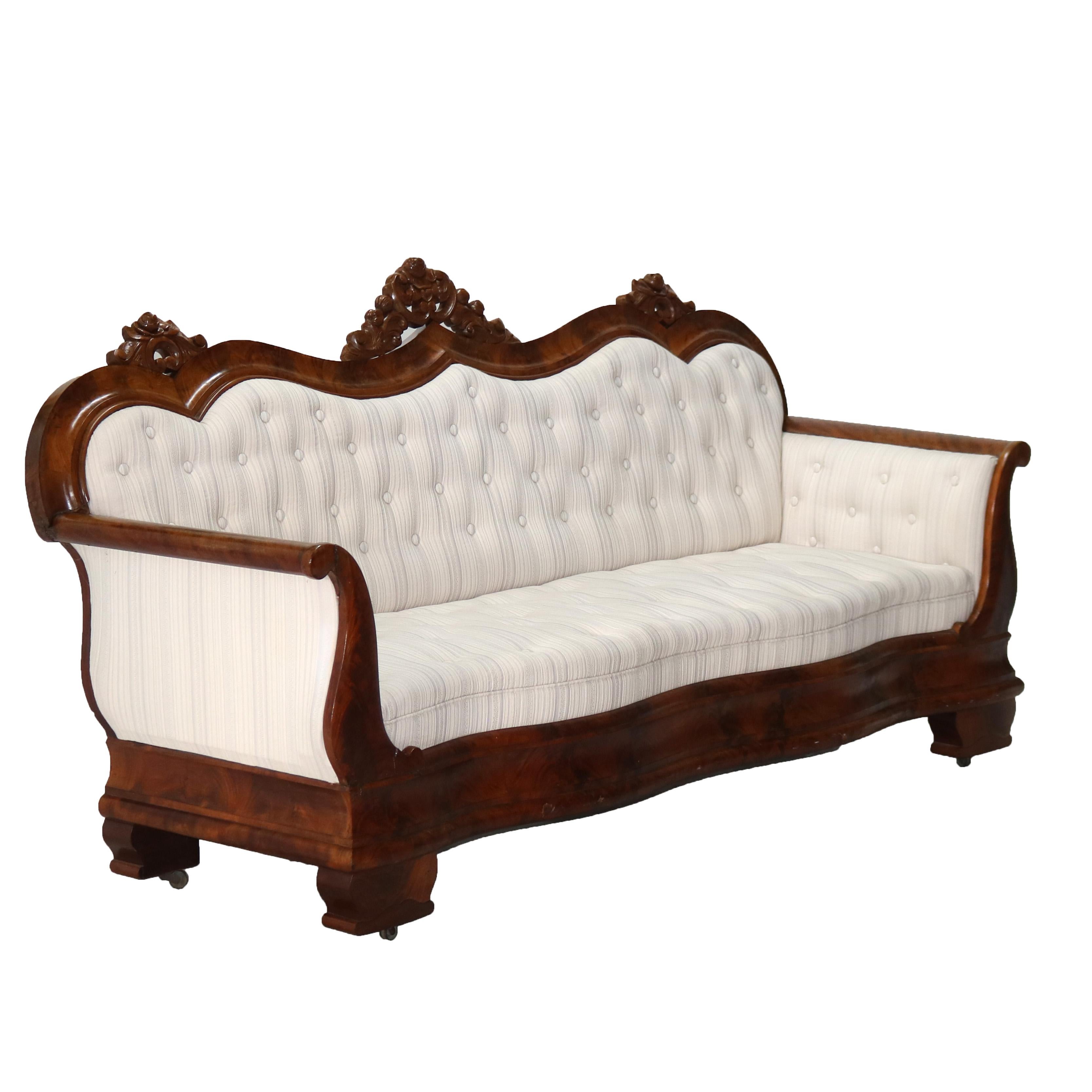 ***Reduced In-House Delivery Rates - Click on “Ask Seller” to Request a Quote***

Antique American Empire Foliate Carved Flame Mahogany Sofa in the Manner of Quervelle C1850

Measures- 42