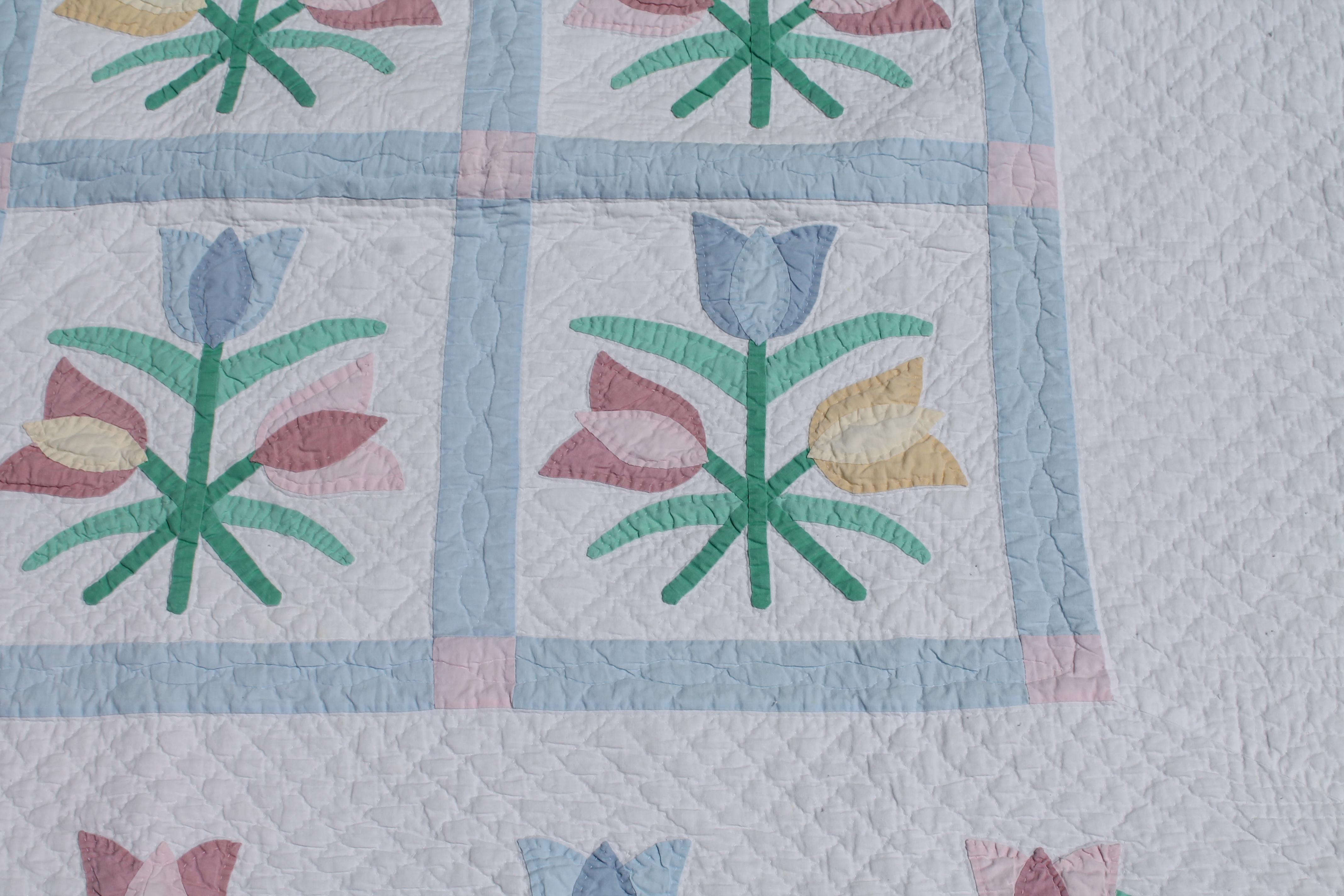 This fine detailed applique is late but great with fine piece work and quilting.