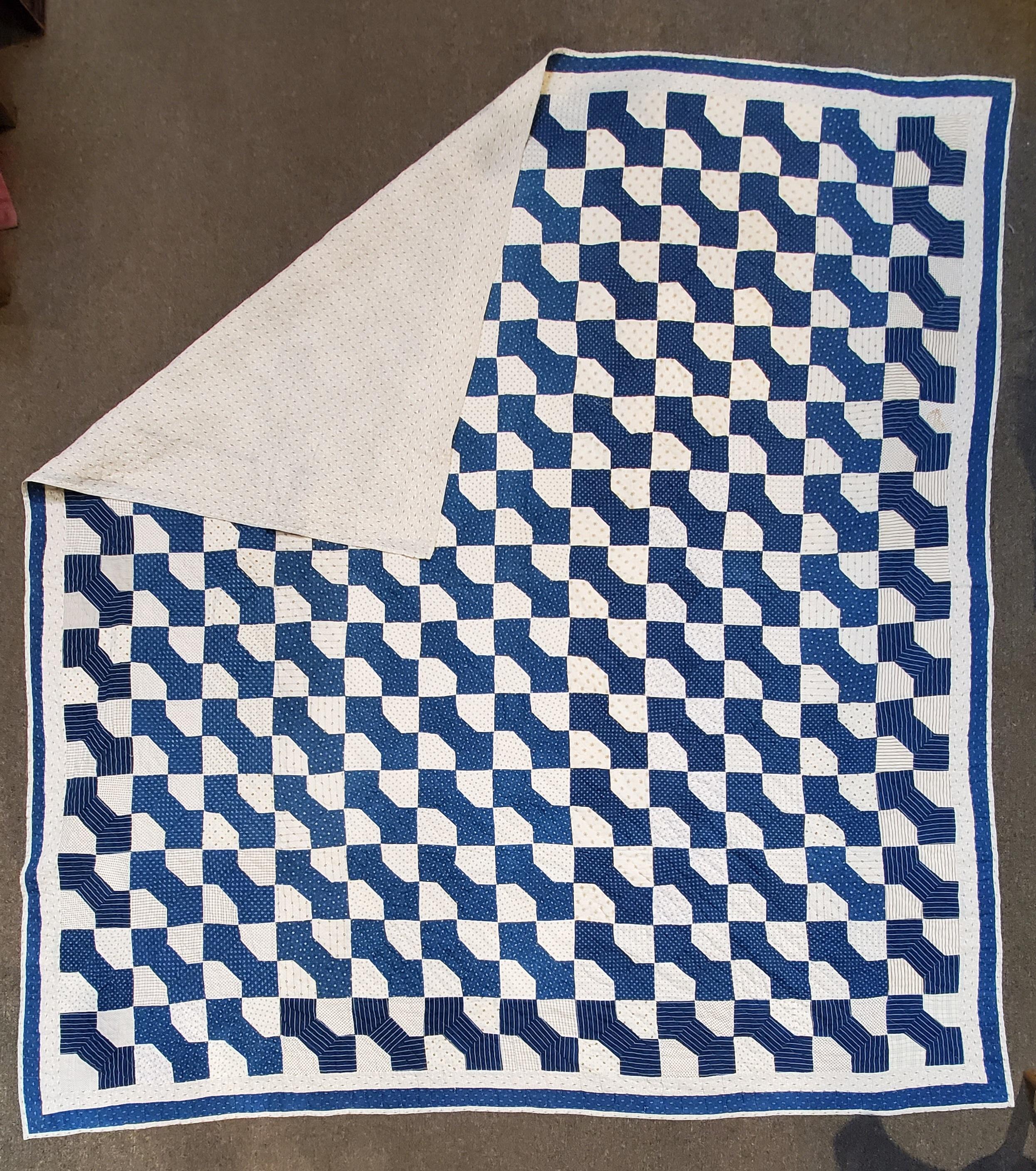 The 19thc blue & white bow tie quilt in fine condition. Geometric pattern and nice quilting.