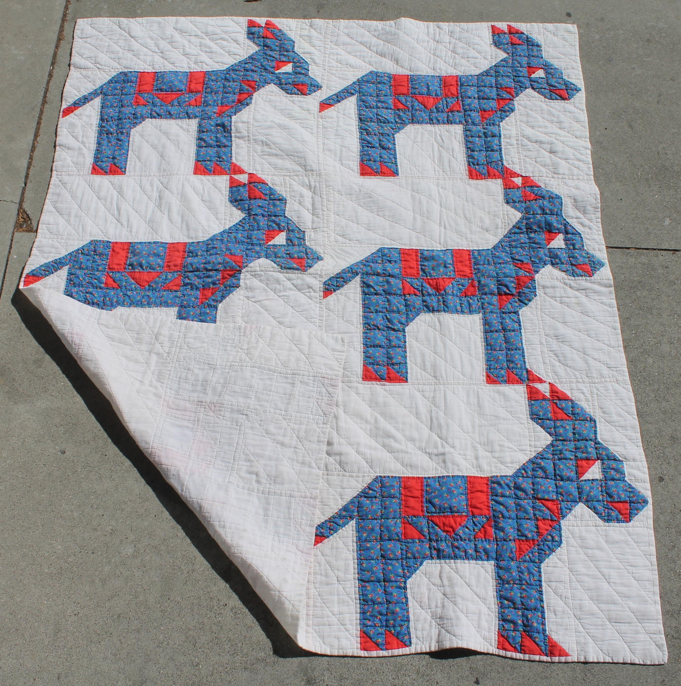 This folky red, white and blue donkey quilt is in good condition and is a rare pattern to find.