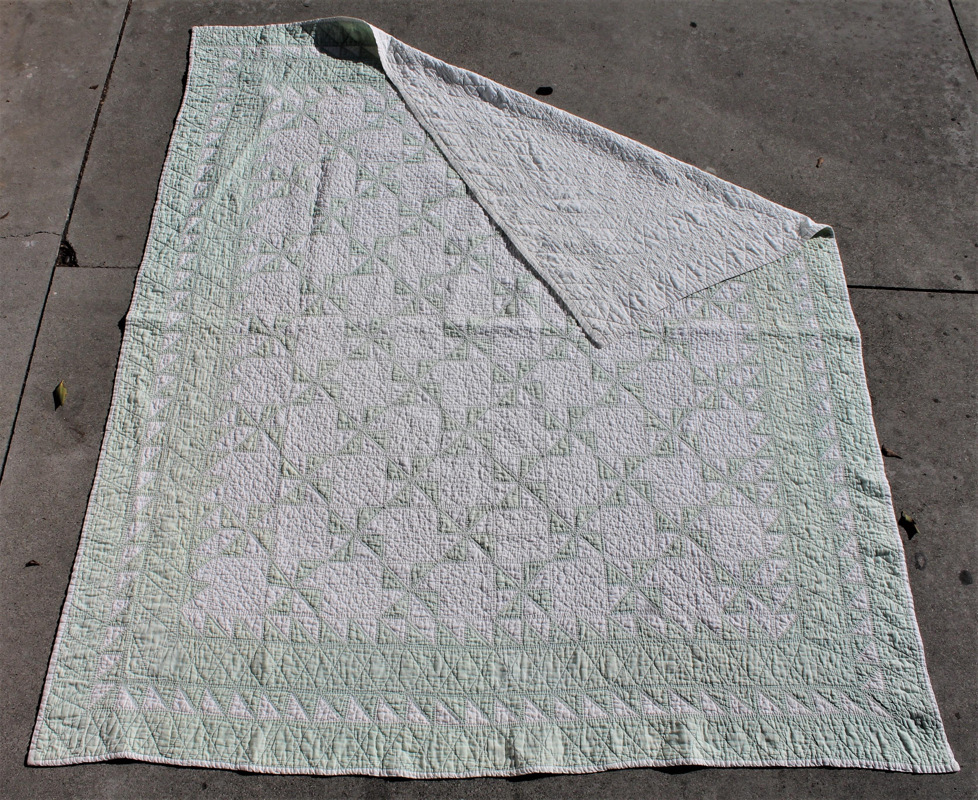 green and white quilts