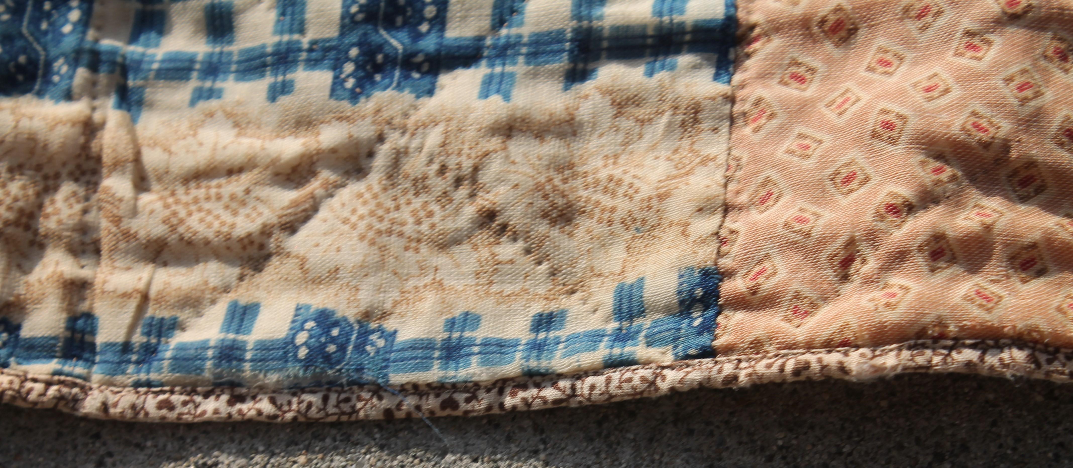 Antique Quilt in Wool with Cotton Calico Backing In Distressed Condition For Sale In Los Angeles, CA
