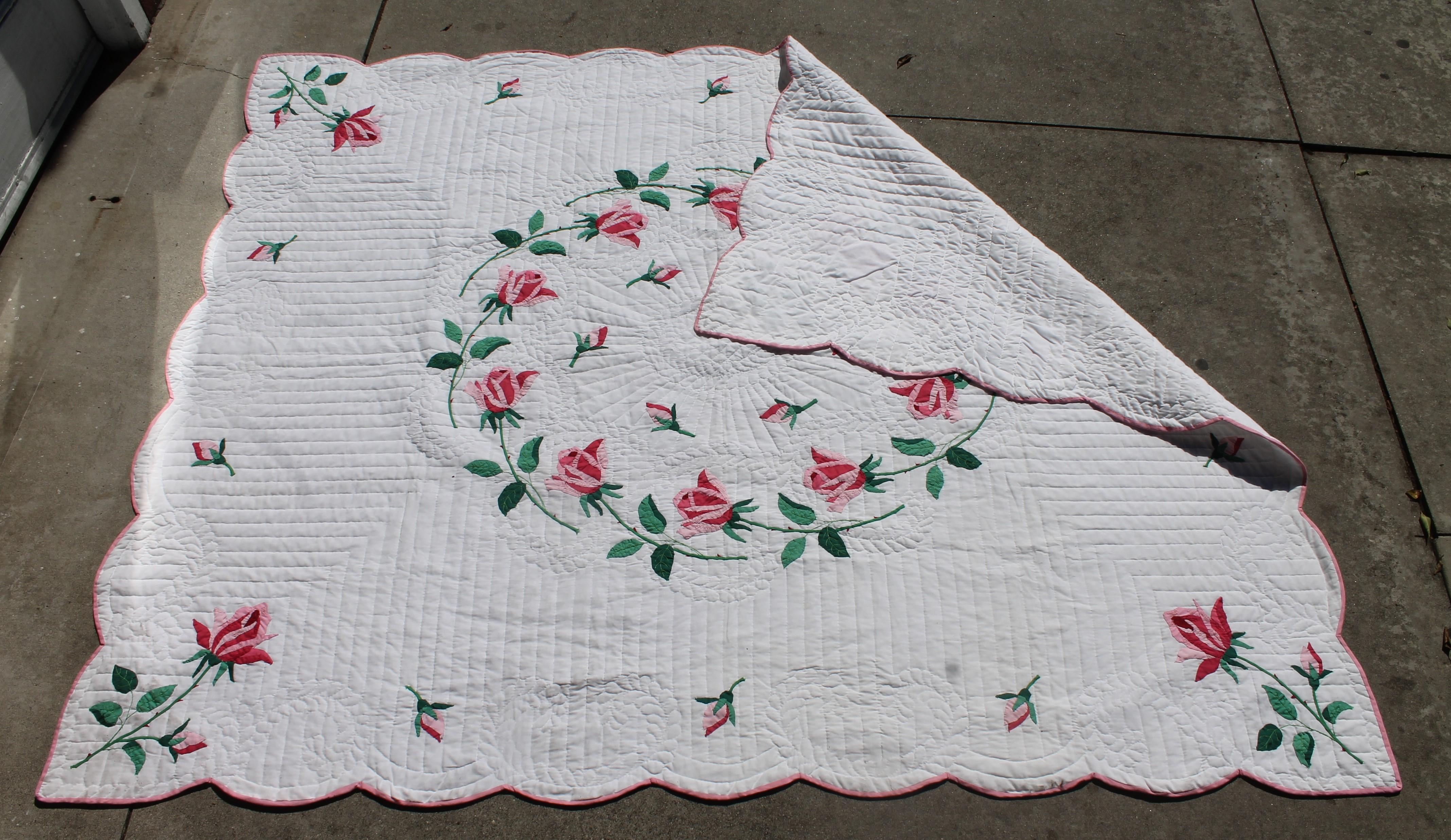 Beautiful handmade rose applique quilt in amazing condition. Stellar pattern and great stitching The binding is in great condition. Professionally cleaned.