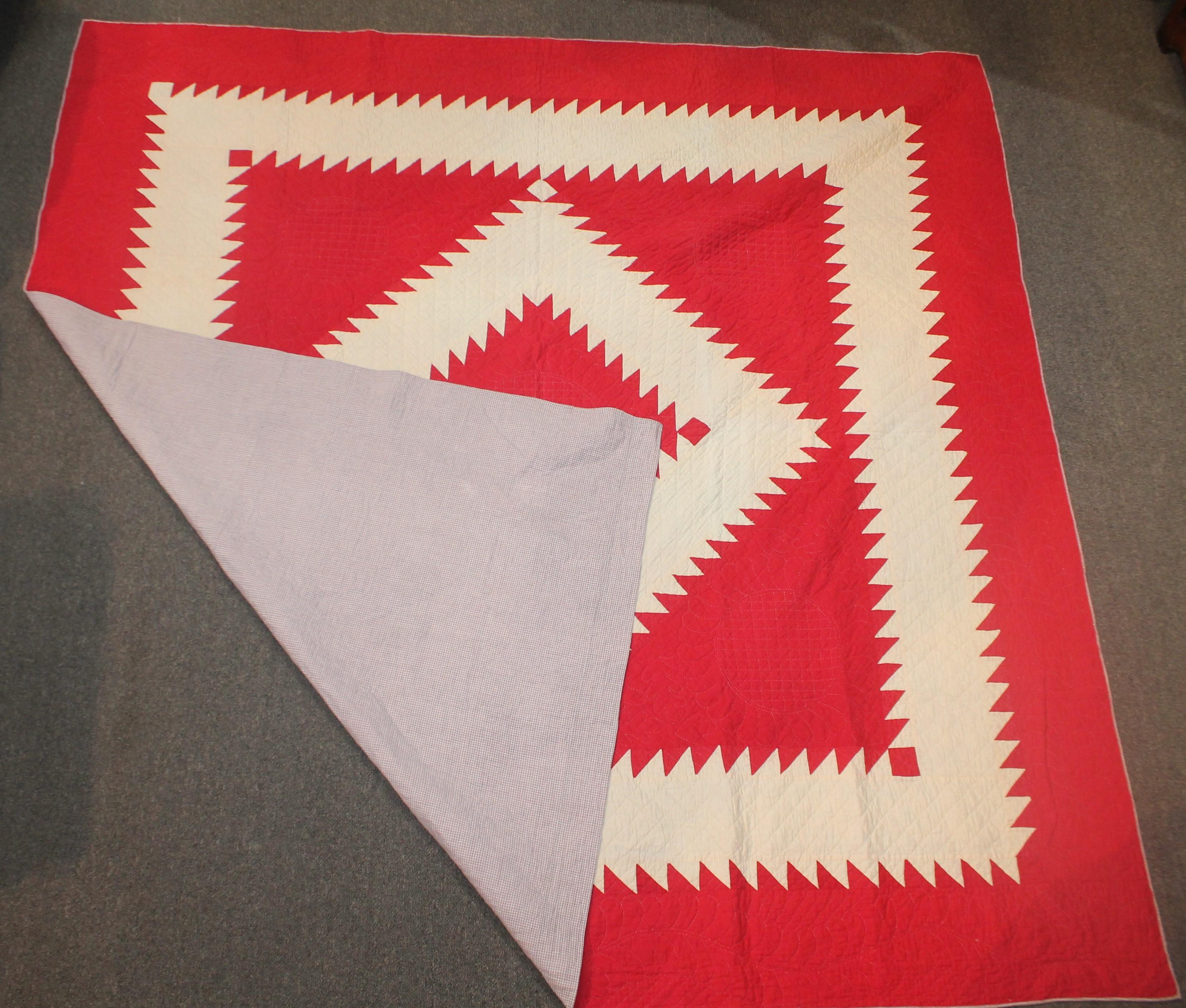 This fine 19th century red and white saw tooth diamond in a square is in fine condition. This is a Lancaster Country, Pennsylvania quilt is in fine condition and has wonderful quilting. The backing is in a homespun linen fabric.
