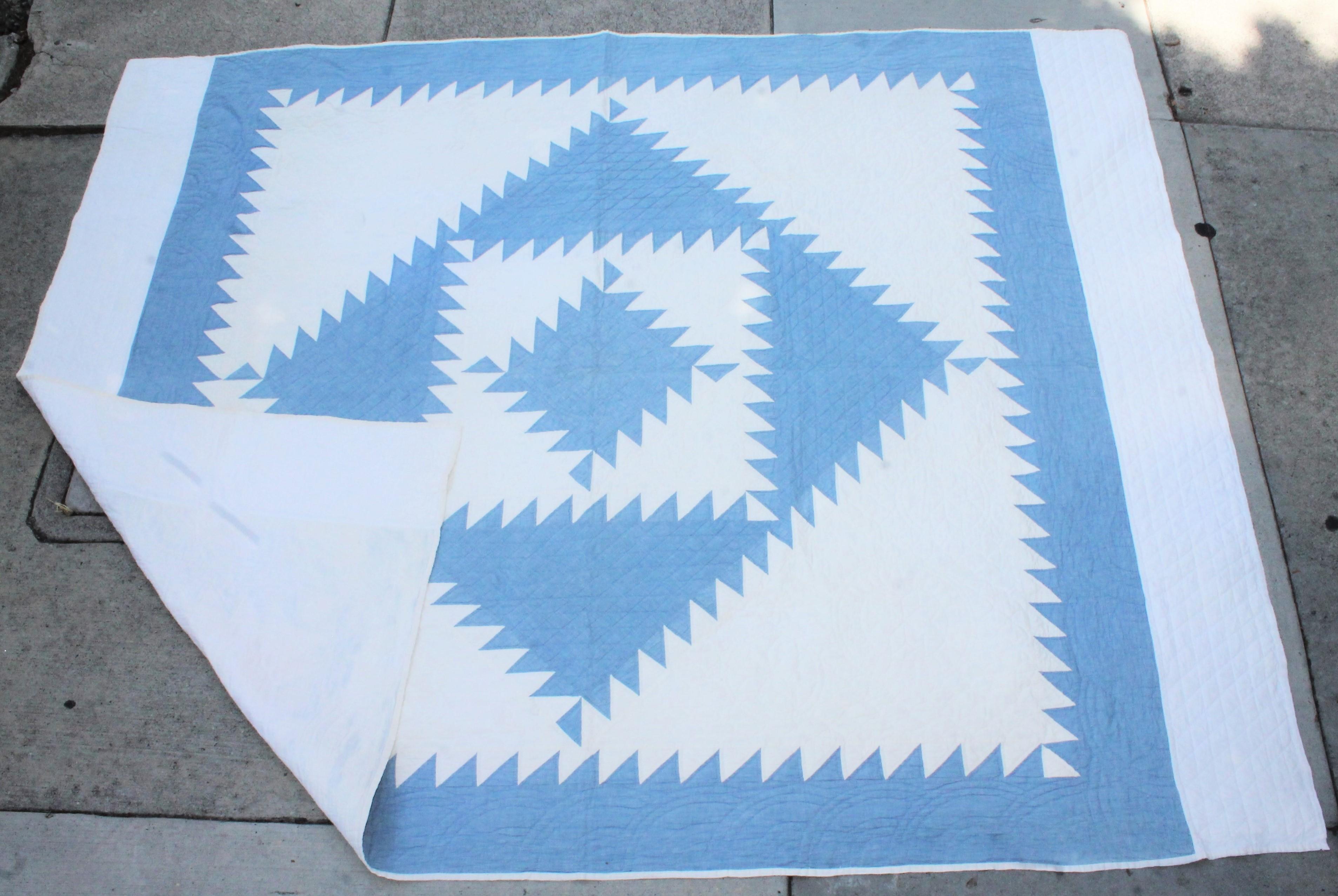 This masterpiece quilt has amazing quilting and piece work. It is a shambrea blue fabric on a white ground. Fantastic workmanship. This was found and probably made in Lancaster County, Pennsylvania.