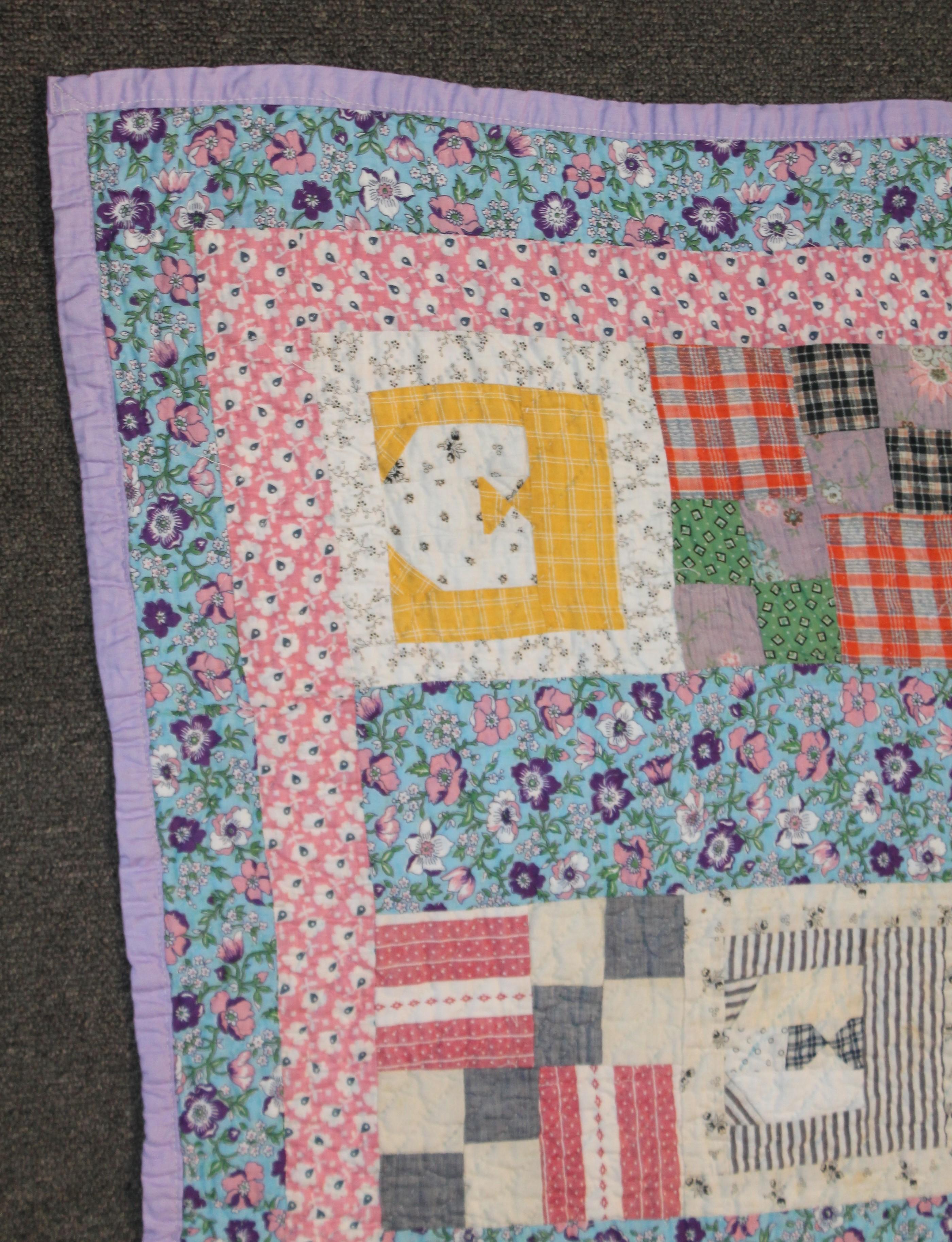 This folky hand sewn and pieced quilt is from the 1920s and has the letter E is sewn in. The folky fabric is funky and different prints and calicos. The quilt is in very good condition.