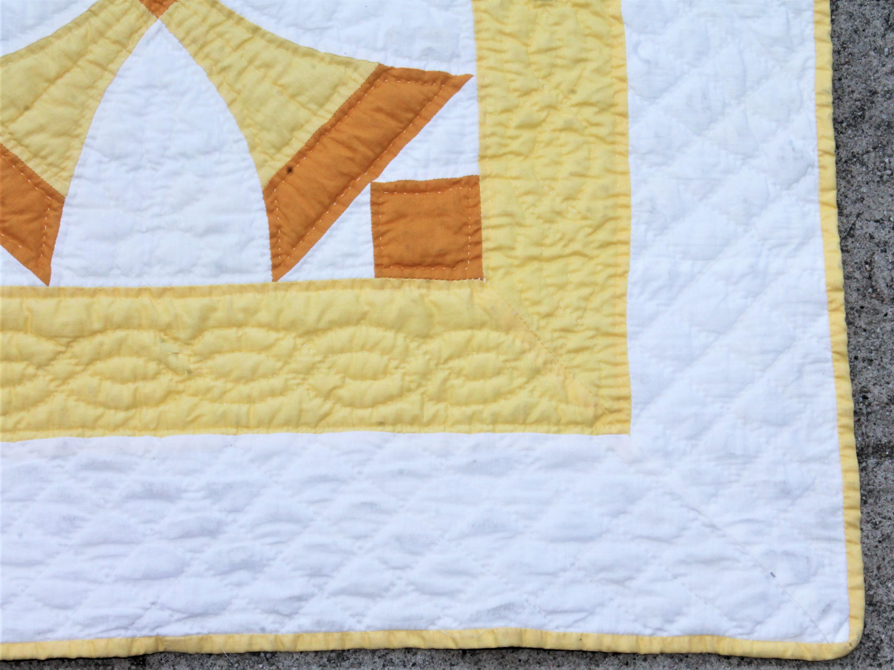 yellow and white quilts