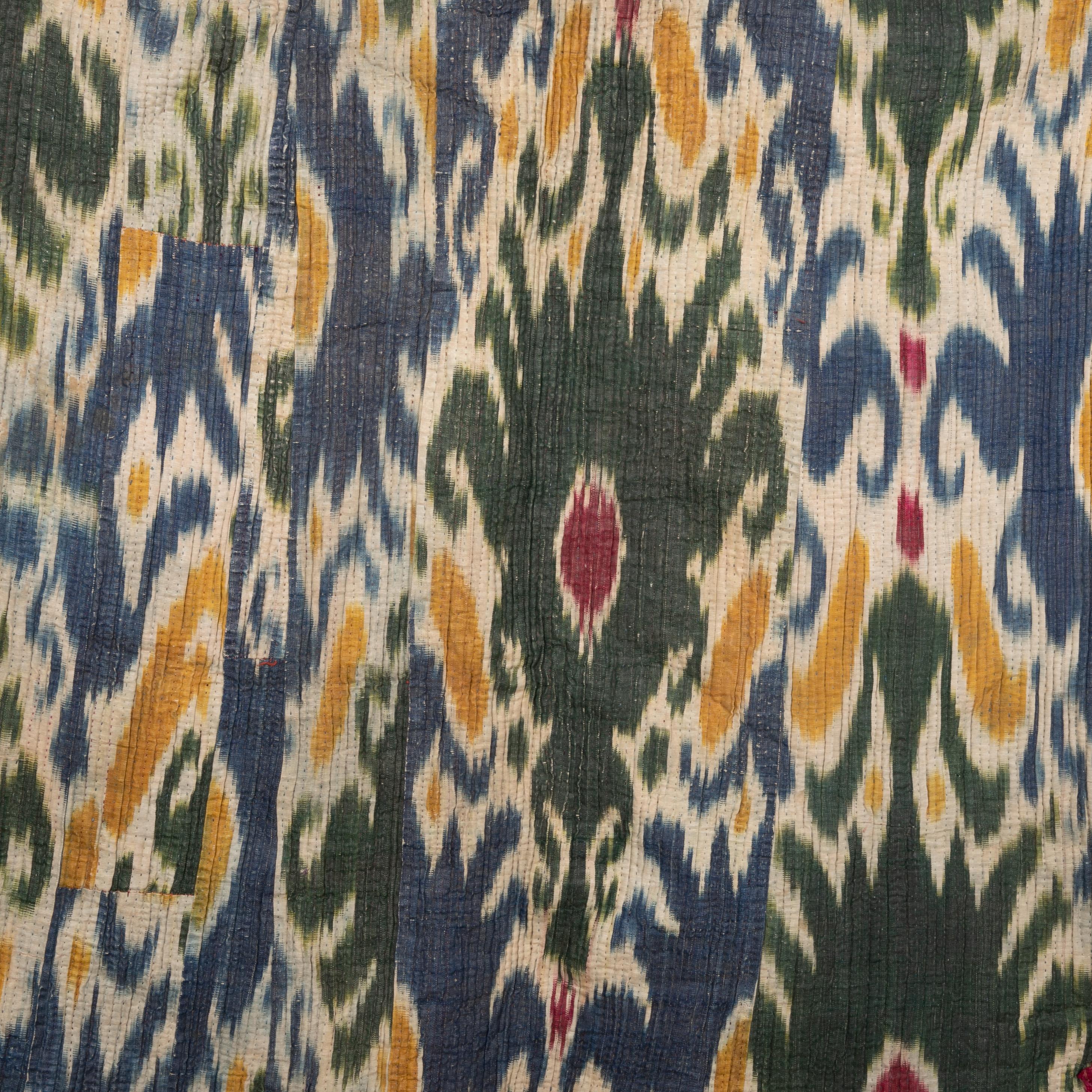19th Century Antique Quilted Ikat Chapan from Khorazm, Uzbekistan, late 19th C. For Sale
