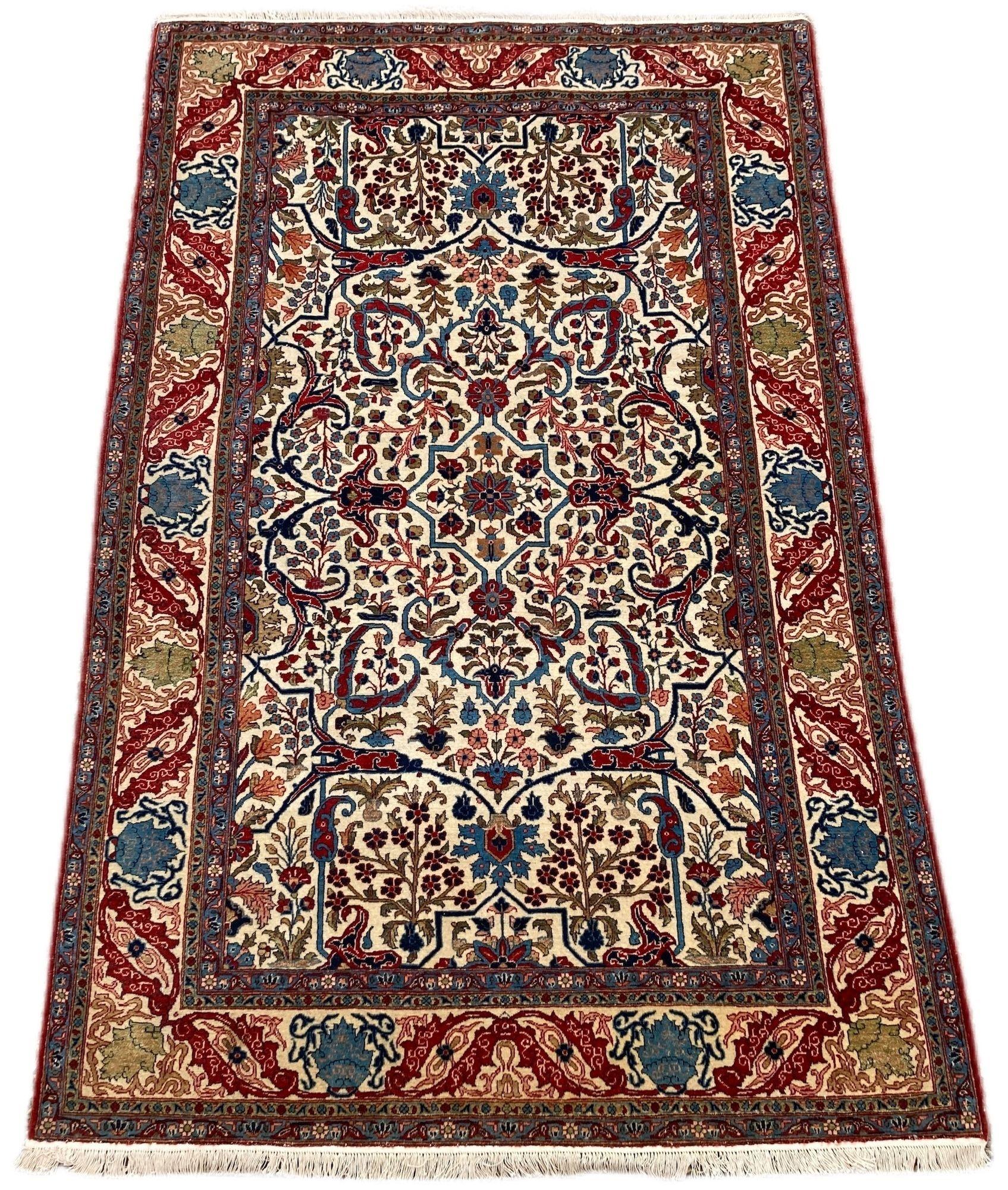 A highly decorative antique Qum rug, hand woven circa 1910 with an elegant, all over Garrous design on an ivory field. Finely woven with lovely wool quality and great secondary colours of terracotta, greens and blues.
Size: 2.10m x 1.36m (6ft 11in x