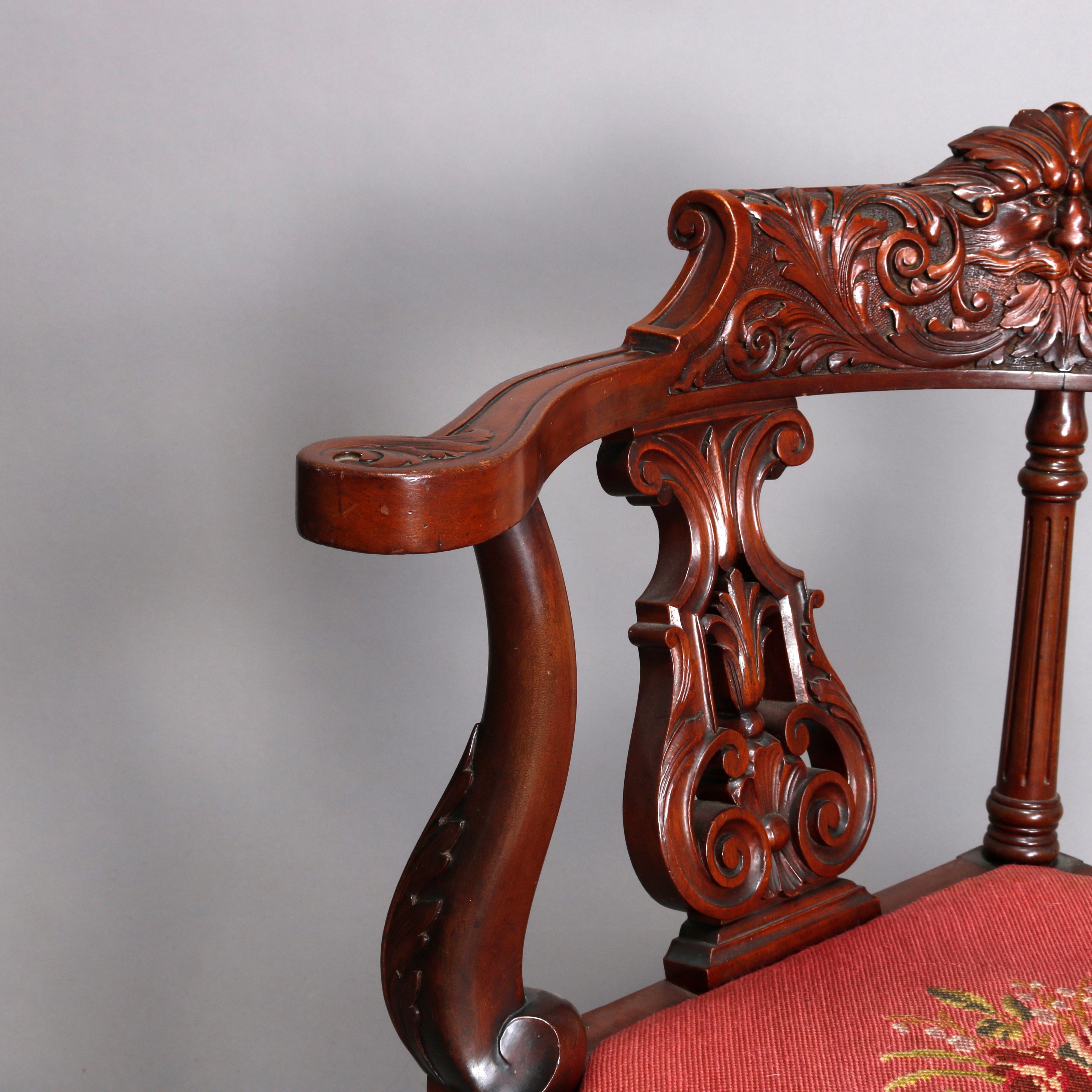 antique chair with carved face