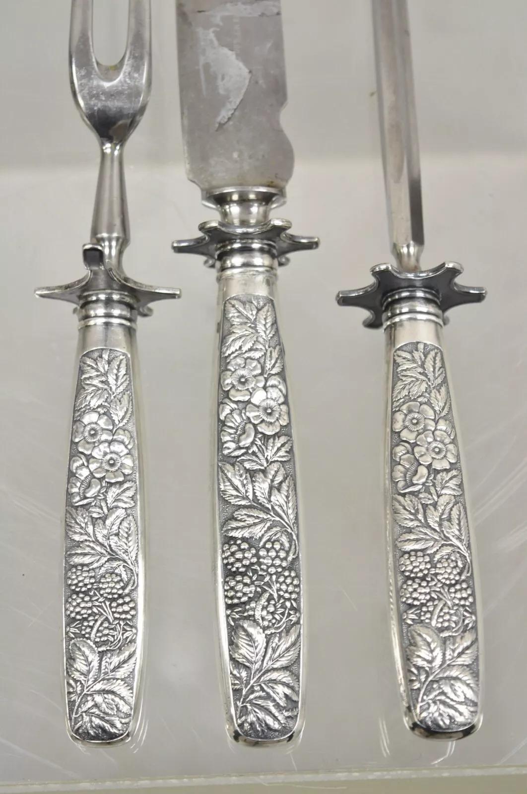 Antique R Wallace & Sons Victorian Silver Plated Repousse Meat Carving Set - 3 Pc Set (Knife, Fork, Sharpener)  Circa Early to Mid 20th Century.
Measurements:  
Knife: 15