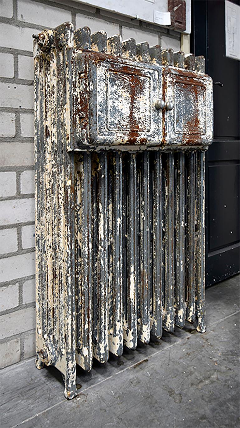 Very unique radiator with a small hatch where the plates kept warm.