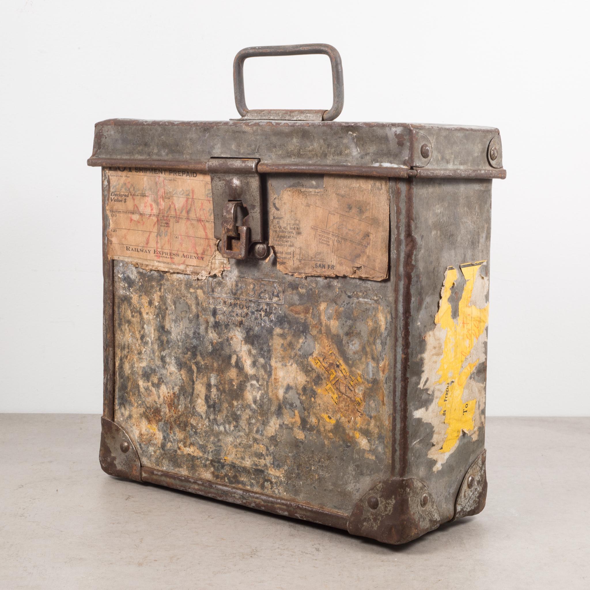 About:

An antique galvanized steel shipping strongbox with crisscross lock, handle, heavy reinforced corners and several original dated shipping labels.

Creator: Railway Express Agency Inc.
Date of manufacture: circa 1930s.
Materials and