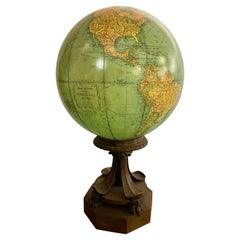 Antico globo terrestre Rand McNally, vetro, illuminato, insolita base in bronzo
