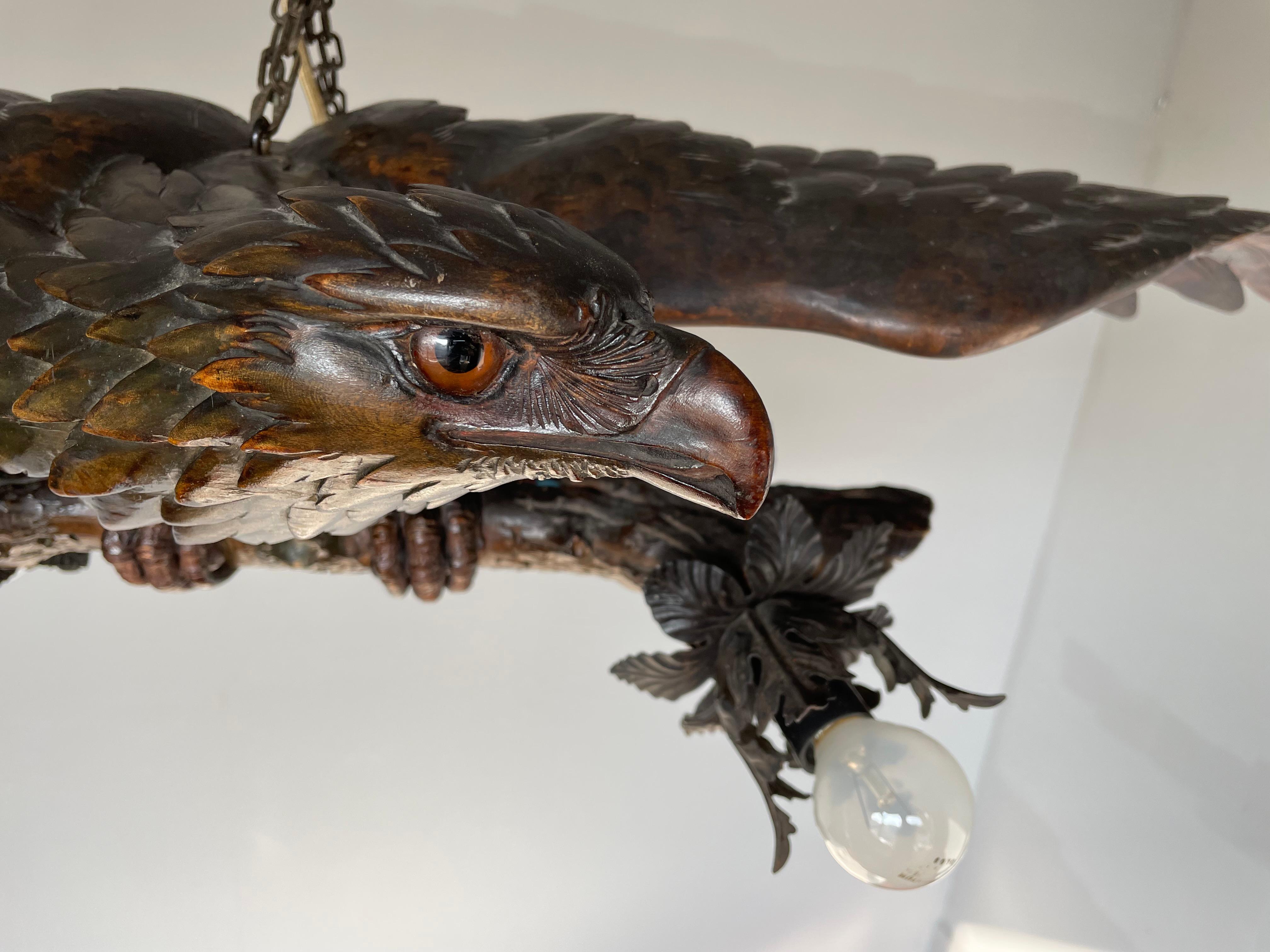 Blackened Antique, Rare and Large Hand Carved Black Forest Flying Eagle Pendant Chandelier For Sale