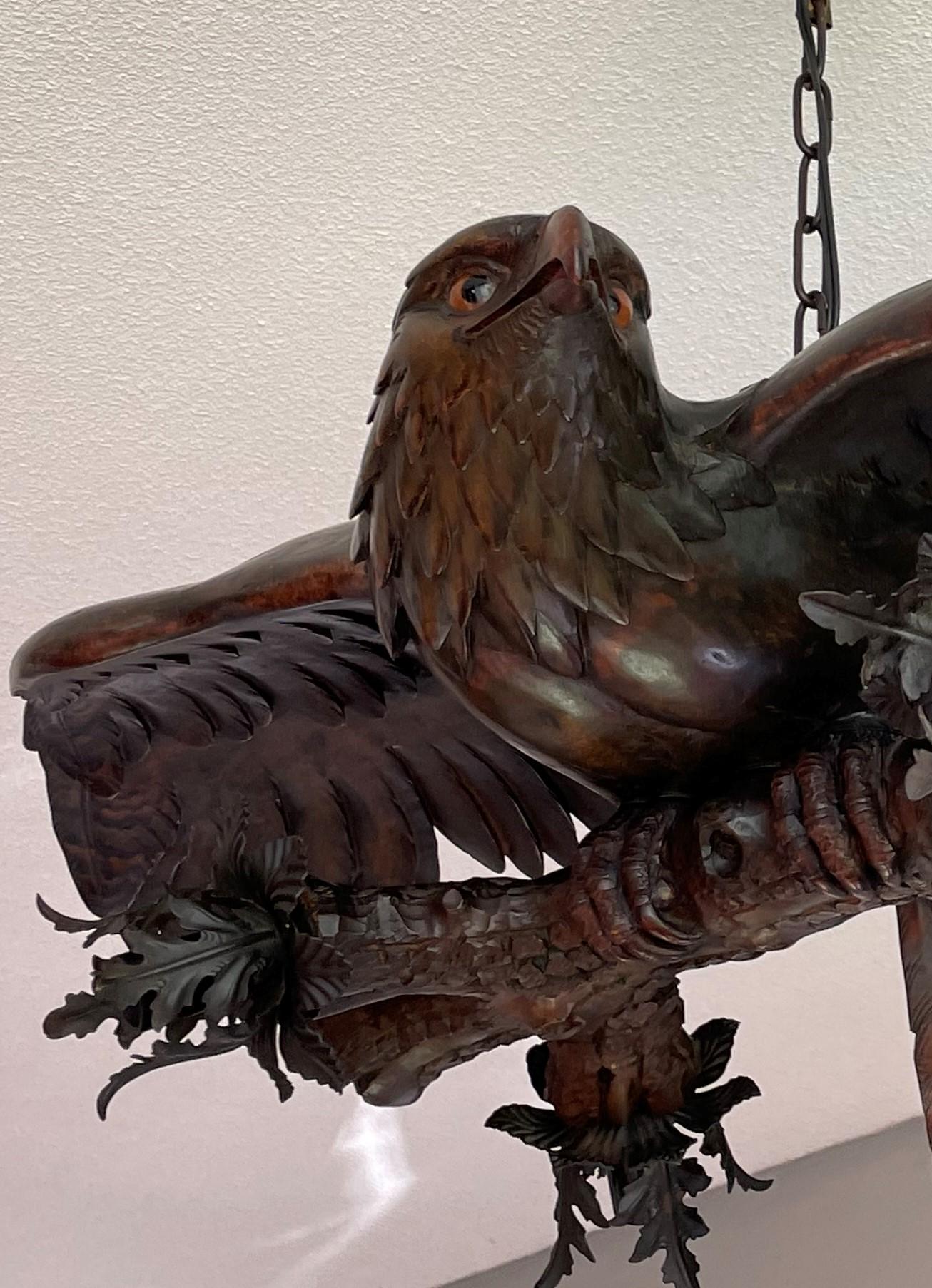 Brass Antique, Rare and Large Hand Carved Black Forest Flying Eagle Pendant Chandelier For Sale