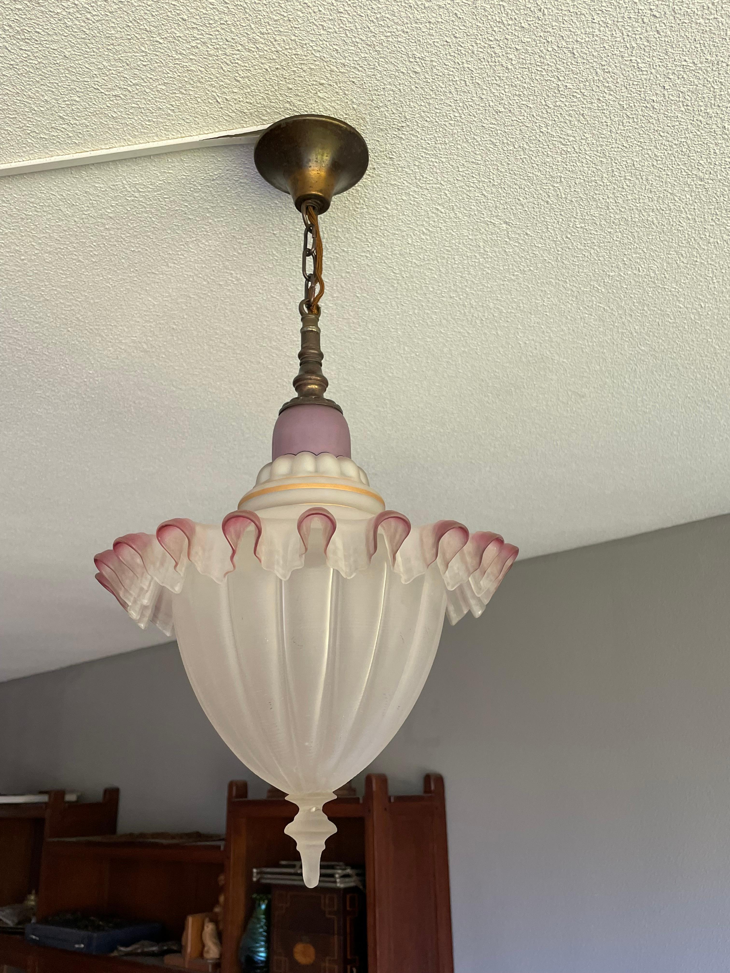Incredibly beautiful and truly stylish antique light fixture.

This rare, beautifully designed, very stylish, all hand-crafted and excellent condition pendant is destined to grace the living space of someone with exceptional taste. We know that is a
