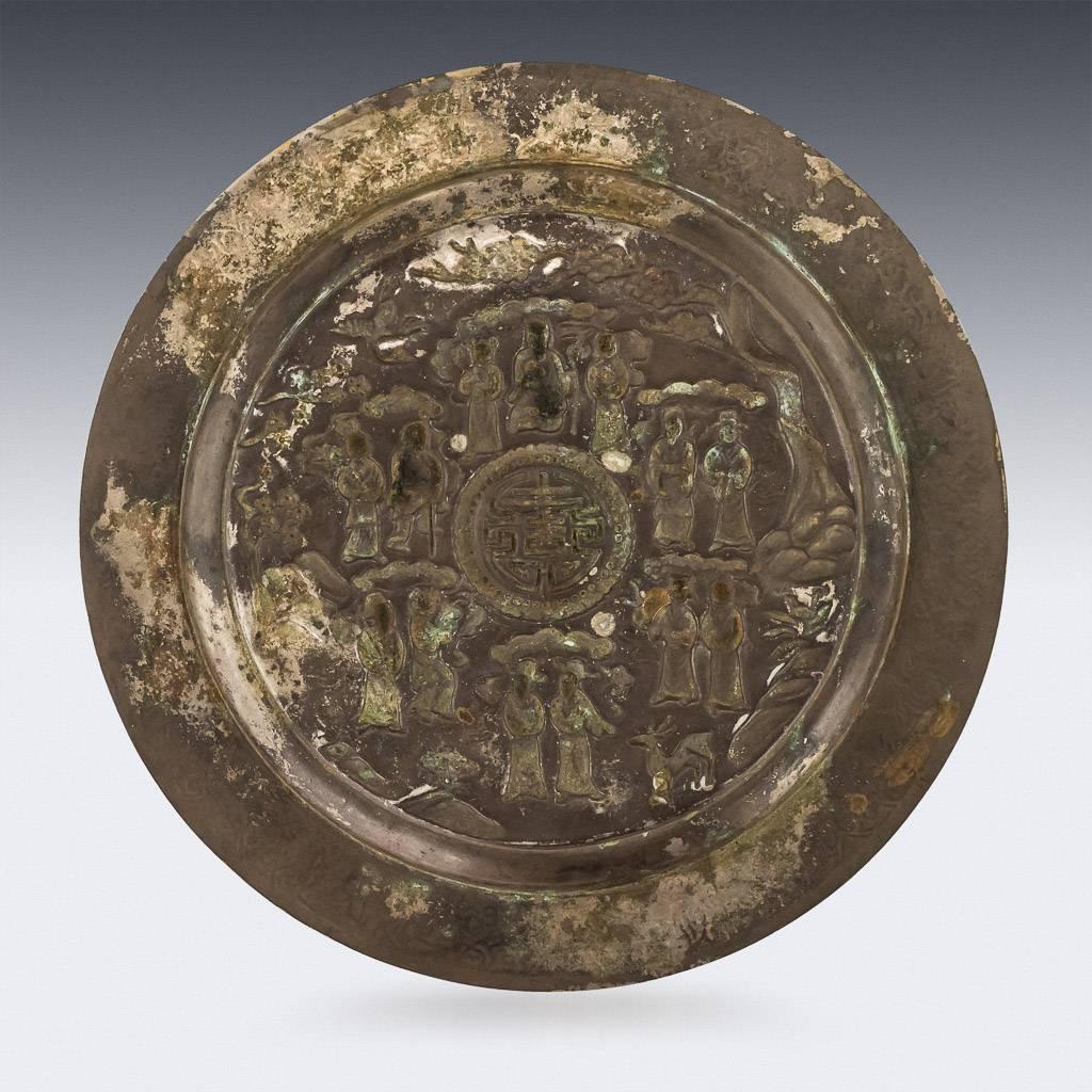 Antique 17th century extremely rare Chinese Ming dynasty solid silver-gilt dish, with a wide everted rim rising from a flat base, the interior centred with a shou roundel surrounded by pairs of immortals paying tribute to Shoulao and his two