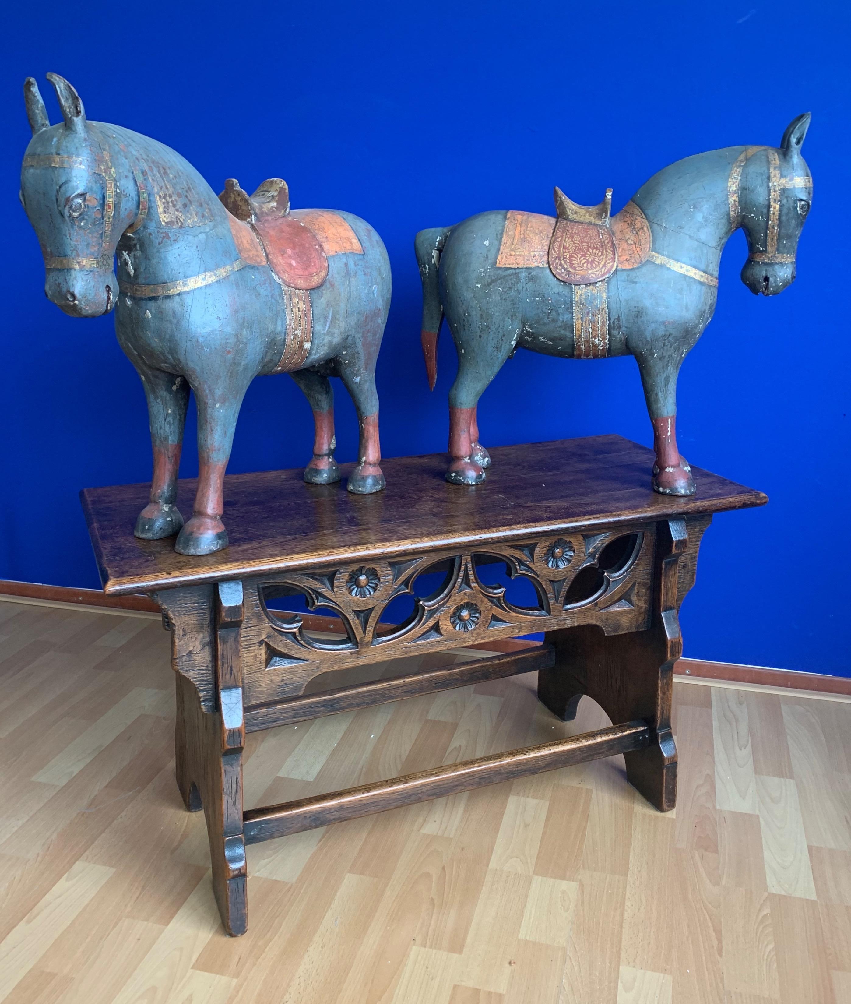 Stunning and unique pair of matching horse sculptures.

With a combined experience of almost 30 years in the antiques trade, we were thrilled to once again find beautifully hand-crafted and decorative antiques that we had never seen before. From