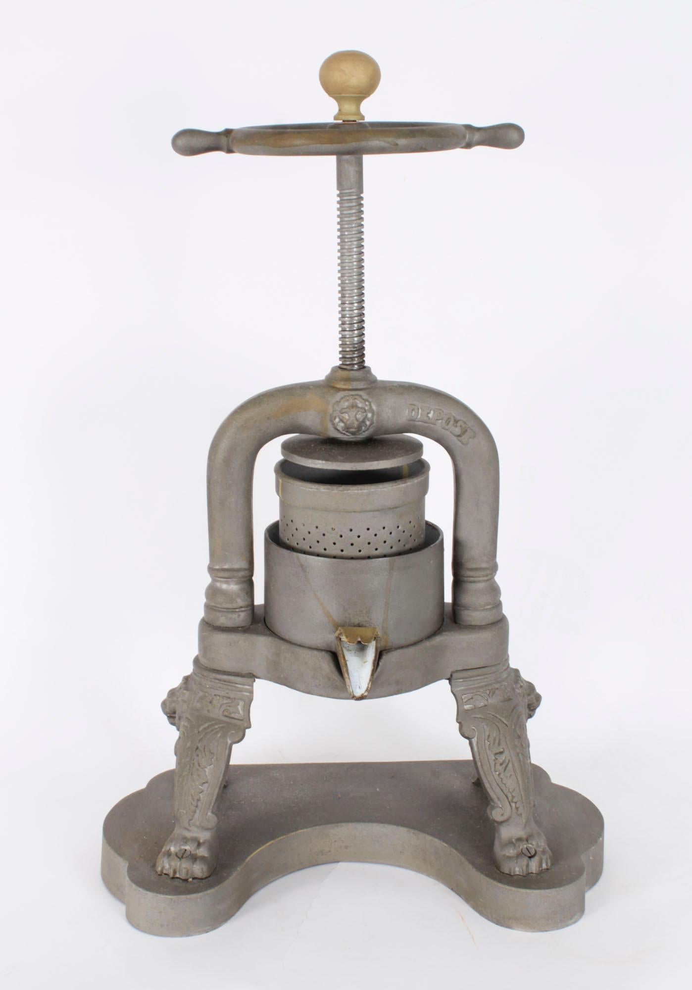 This is a fine substantial antique French  iron and bronze Duck Press, stamped in relief 