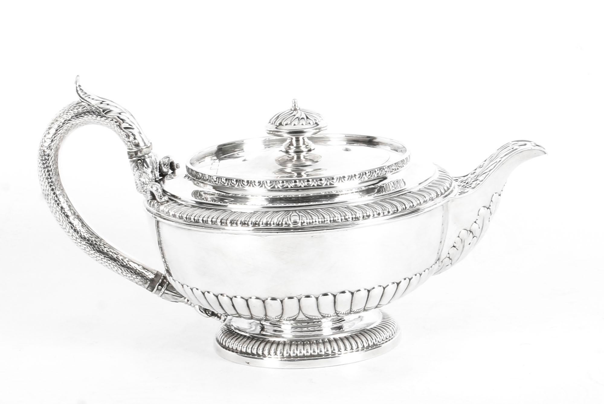 This is an exceptional and very rare antique English George III sterling silver teapot by the world-famous silversmith, Paul Storr, 1810 in date. 
 
This splendid teapot is of a delightful shape and it is profusely chased with half ribbed fluting