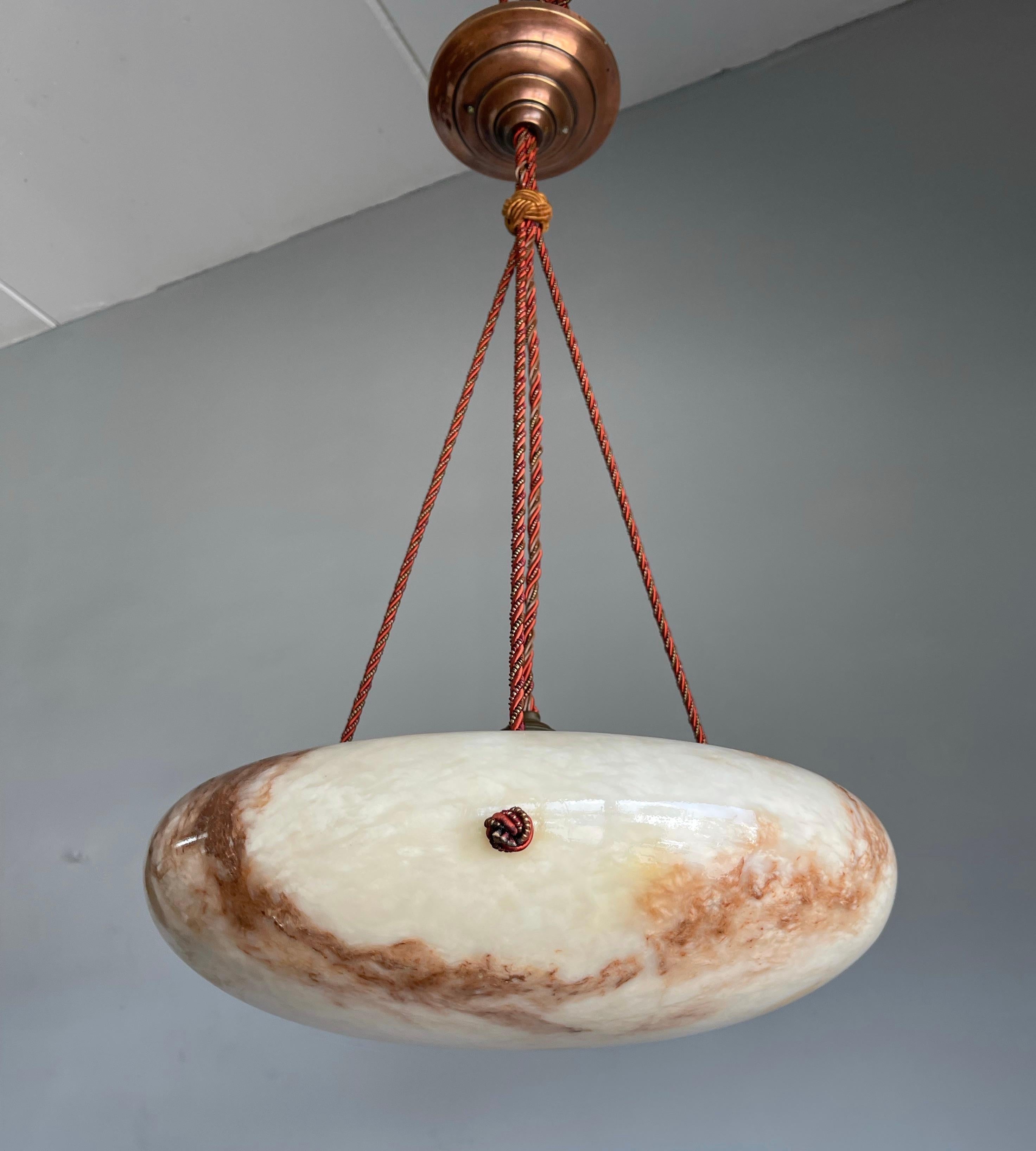 Good size, beautifully rounded design and warm color alabaster pendant.

If you are looking for a good quality antique light fixture to grace your home or office then this beautiful shape and all-handcrafted alabaster chandelier could be perfect