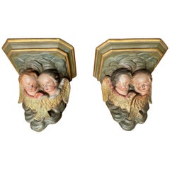Paire de supports d'église anciens et rares pour statues de saints avec sculptures d'anges
