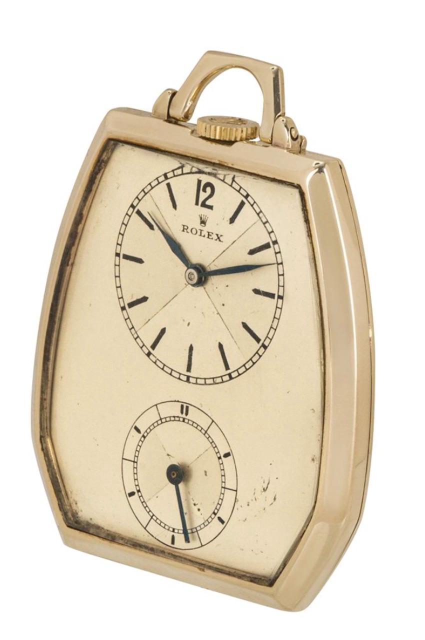 Rolex Prince. A very rare 9ct yellow gold dress pocket watch C1930s

Dial: The excellent silver rare bow tie dial with Arabic twelve and black enamel batons, outer minute track and separate seconds dial with bow tie dial in the seconds dial. A rare