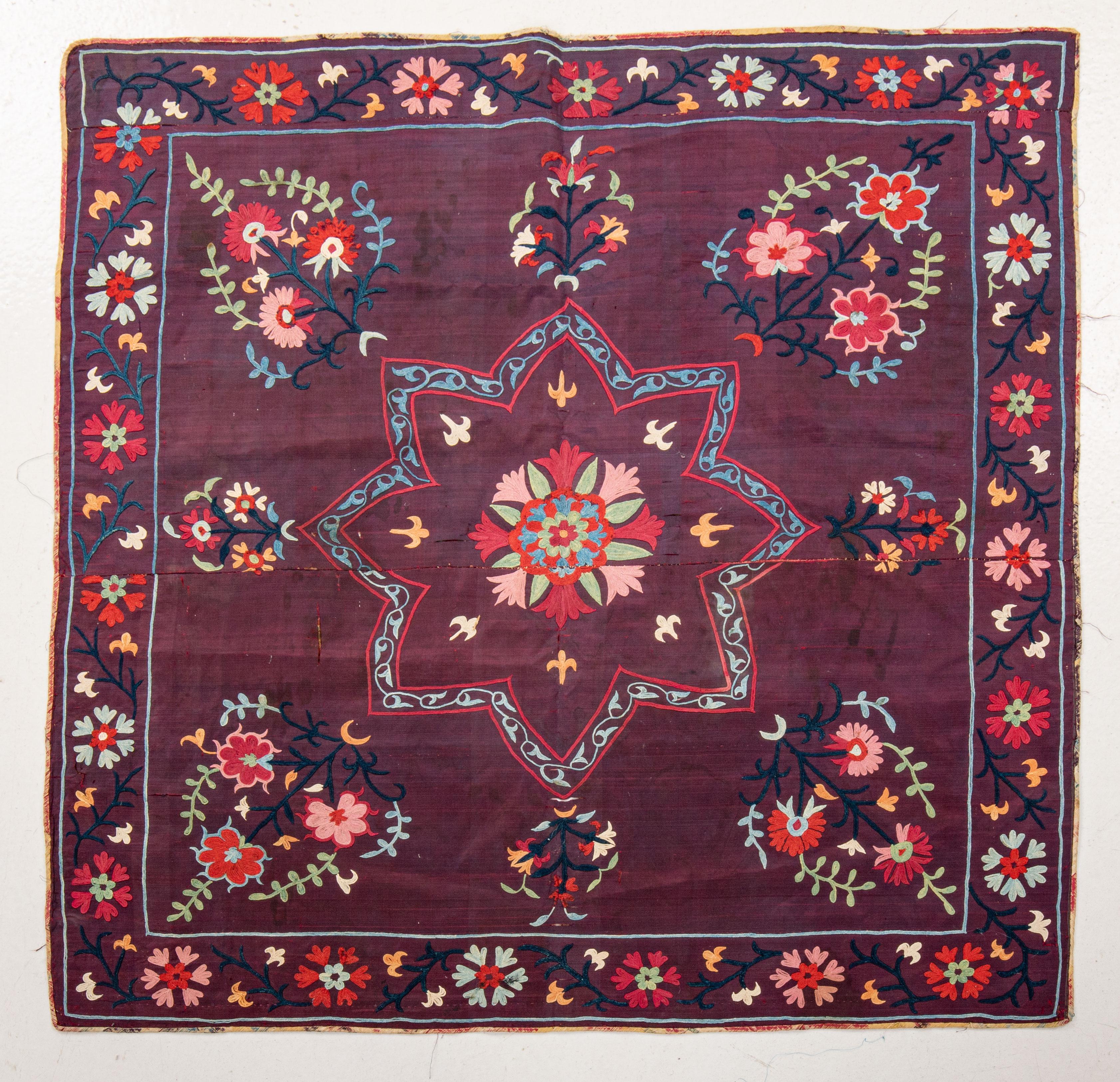A rare , silk background , silk Sharisabz suzani from Uzbekistan.