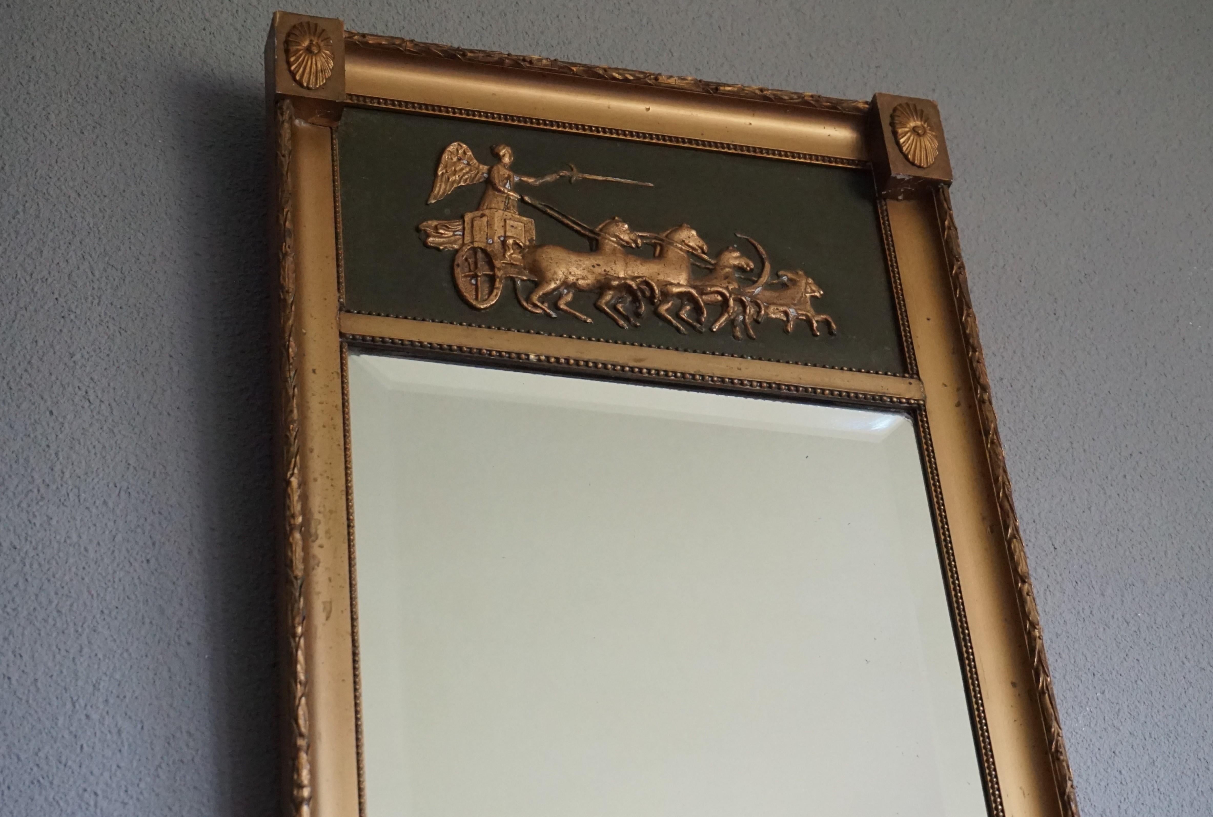 Handcrafted and practical size, 19th century wall mirror.

We have a number of beautiful antique mirrors and this is our latest find, but somehow we always have problems shooting photos that do them justice. In real life they always look so much