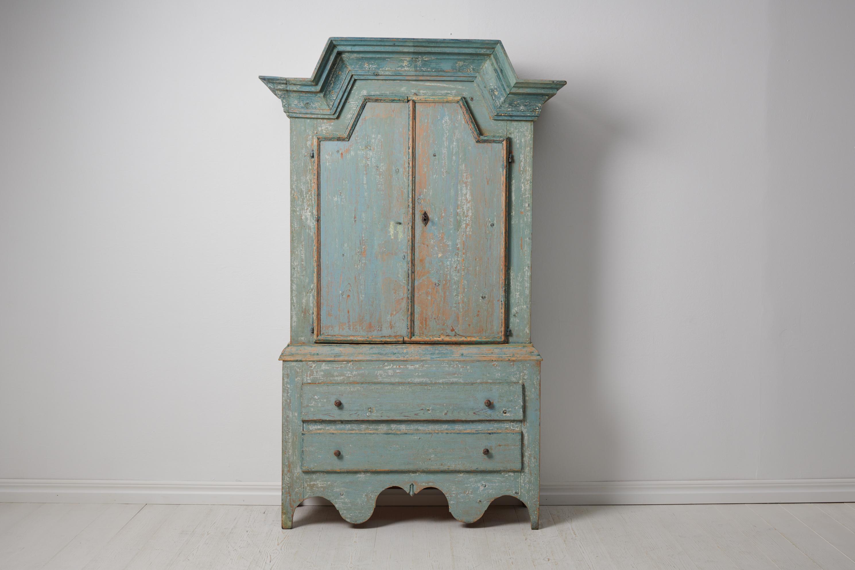 Rare Swedish blue cabinet in folk art from around 1820. This type of cabinet was only made and can only be found the county Jämtland in northern Swedish, close to the Norwegian border. Today the area is most known for its ski resorts, most notably