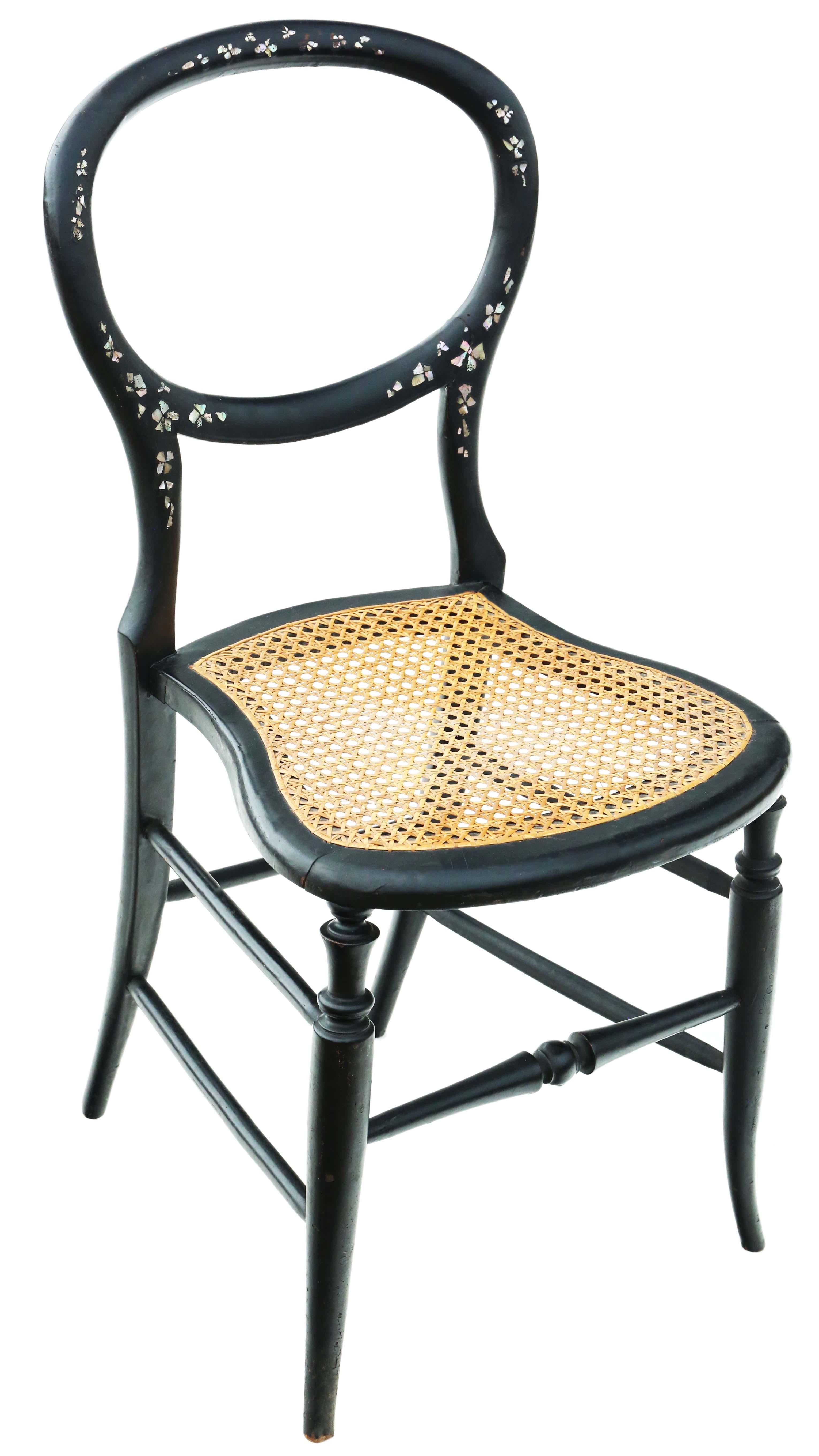 Antique rare Victorian black lacquer mother of pearl inlaid bedroom side chair.

Dates from C1900. Fantastic quality decorative piece, with amazing inlays.

No loose joints or woodworm.

The cane seat is in good order.

Overall maximum dimensions: