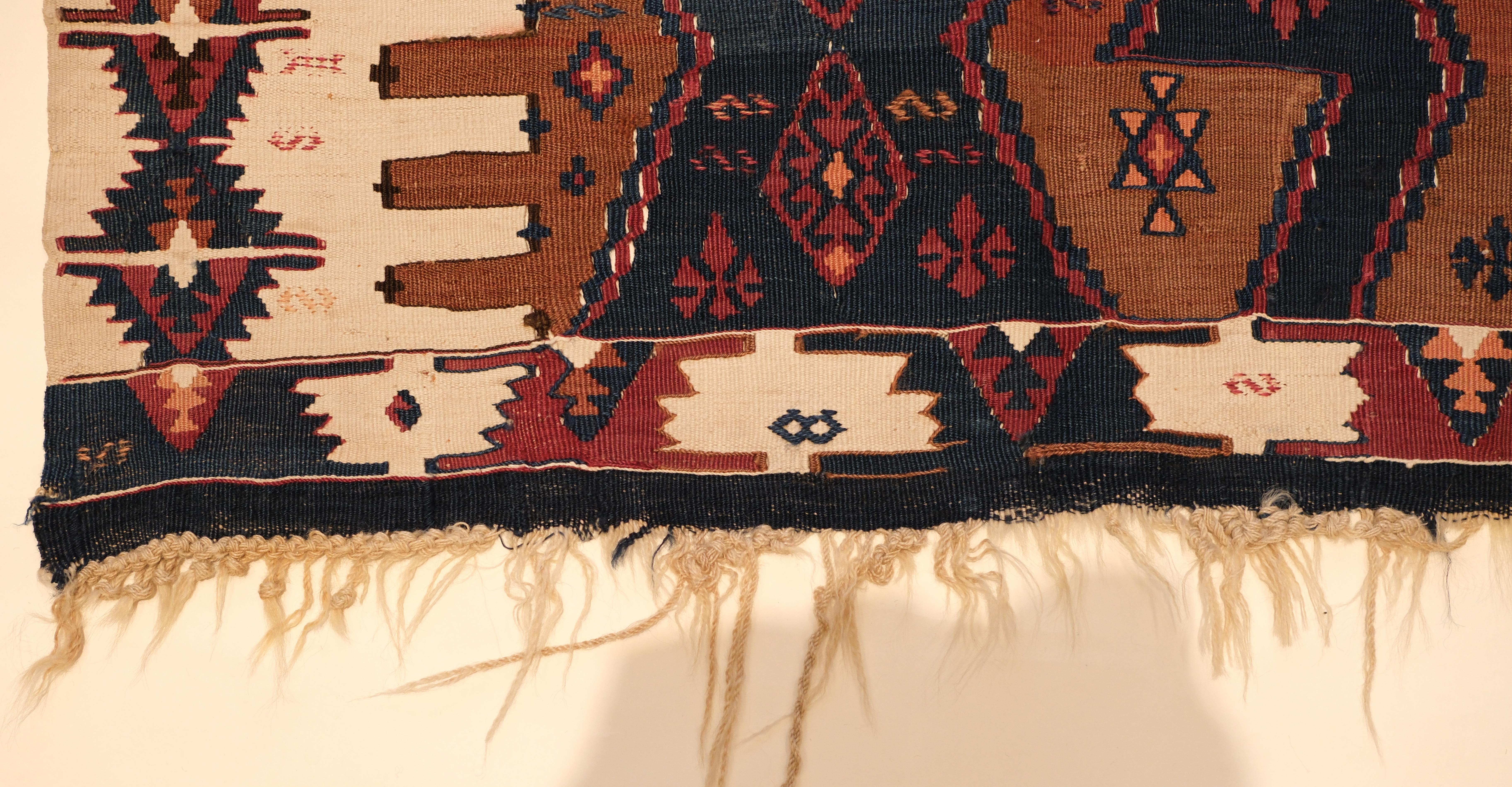 This is an Eastern Anatolian Antique Kilim from the Rashwan, Malatya region, with a rare and beautiful color composition.

This highly collectible antique kilim has wonderful special colors and textures that are typical of an old kilim in