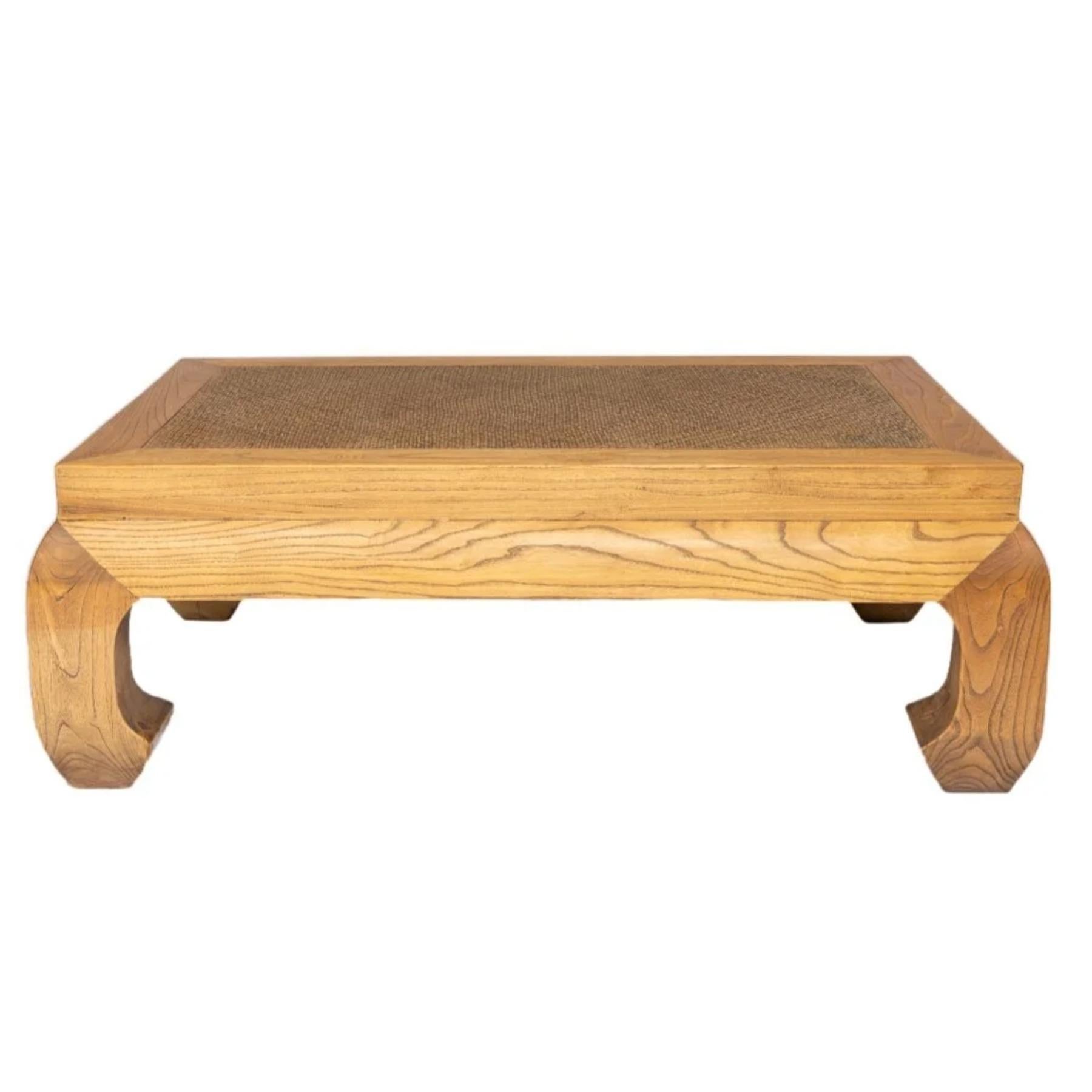 This Antique Chinese coffee table with a woven rattan inset top features elegant lines and lovely substantial proportions. With a beautiful patina and combination of materials, this coffee table will bring a stylish touch to any home. Wear is