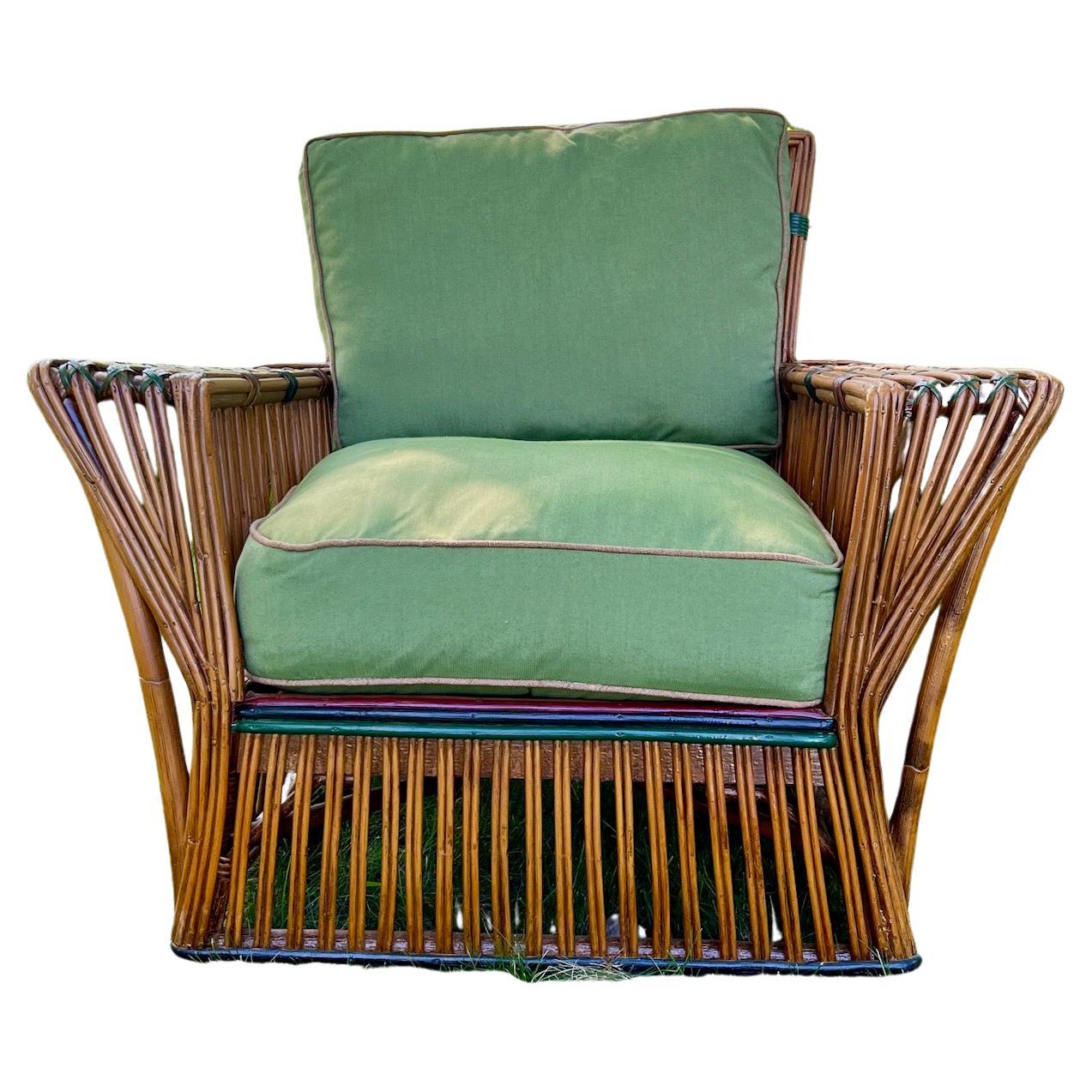 An Antique ,handsome and stylish Rattan Arm Chair in natural finish with colored trim, American,C. 1929. This style of furniture was also often called stick wicker or split reed. Modernist stick wicker was all the rage at this point, consumers