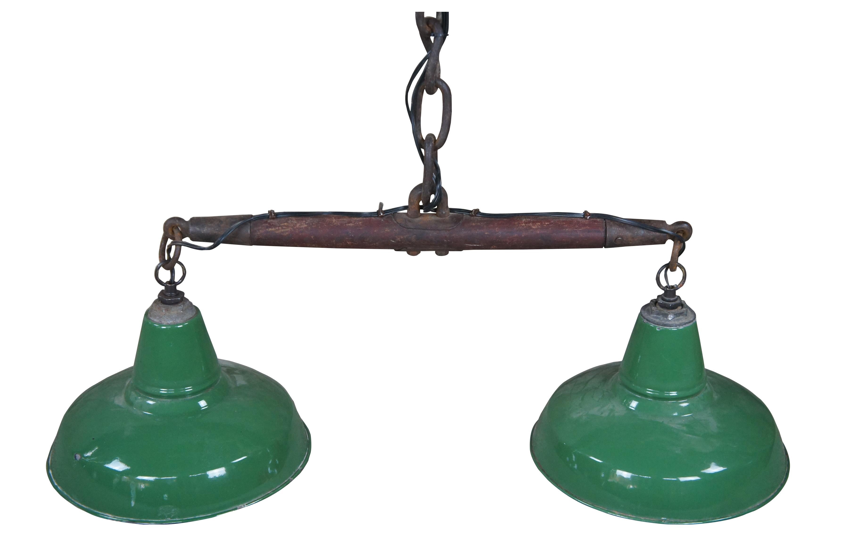 Antique reclaimed industrial green enameled two light hanging lamp or lantern made with a single tree horse harness with heavy iron chain. Measure: 36