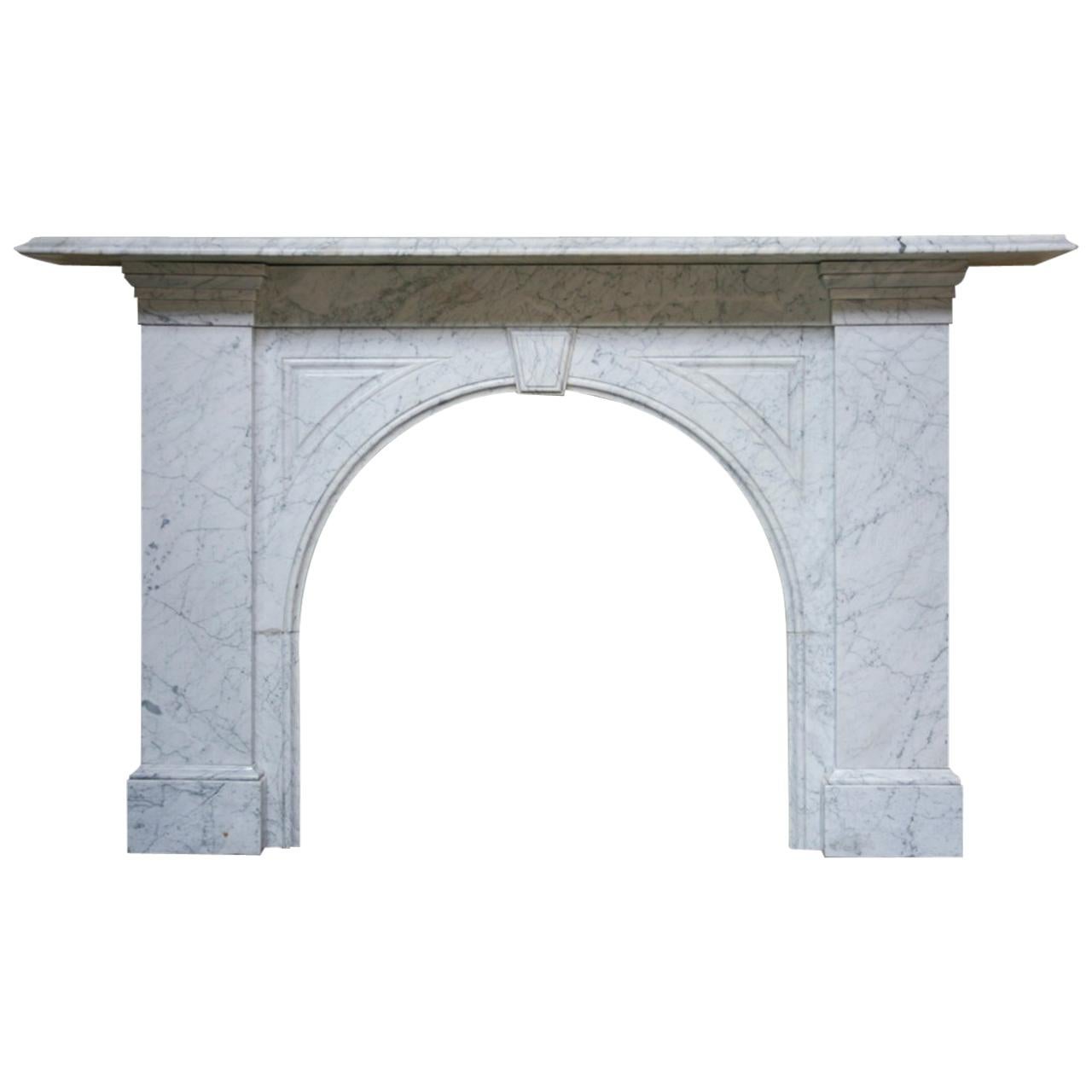 Antique reclaimed Victorian Carrara marble fire surround with arched aperture