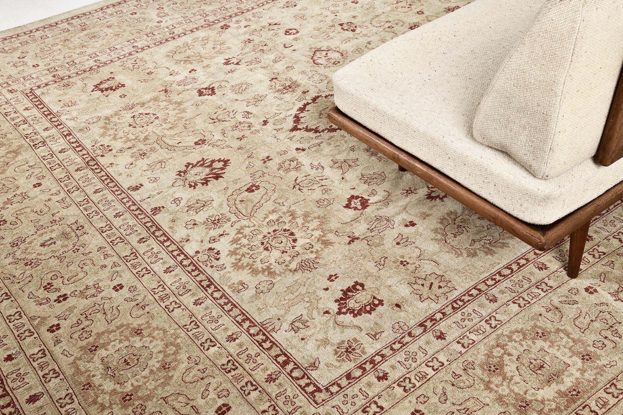 An extraordinary revival rug in our Fable Collection that features delicate stylish floral patterns. Featuring the elaborate vine scrolls and various florid elements in the warm tones of sand, scarlet and gold, this magnificent rug exudes abundance