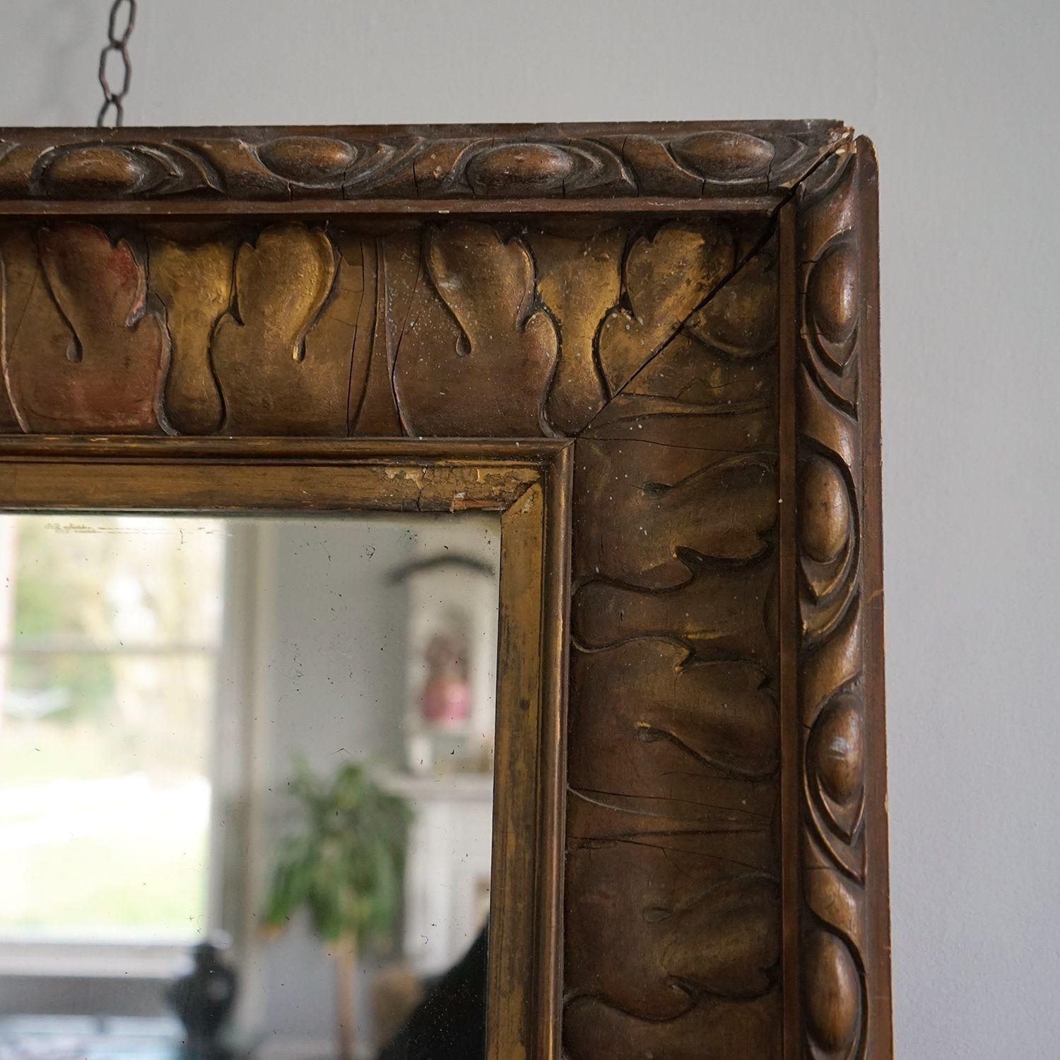 Antique Gilt Gessowall mirror

Simple yet beautiful stylised repeated acanthus leaf detail on the frame.

Original mercury mirror plate with plenty of sparkle, some pitting and wear but still a very usable mirror.

Condition wise it is worn in
