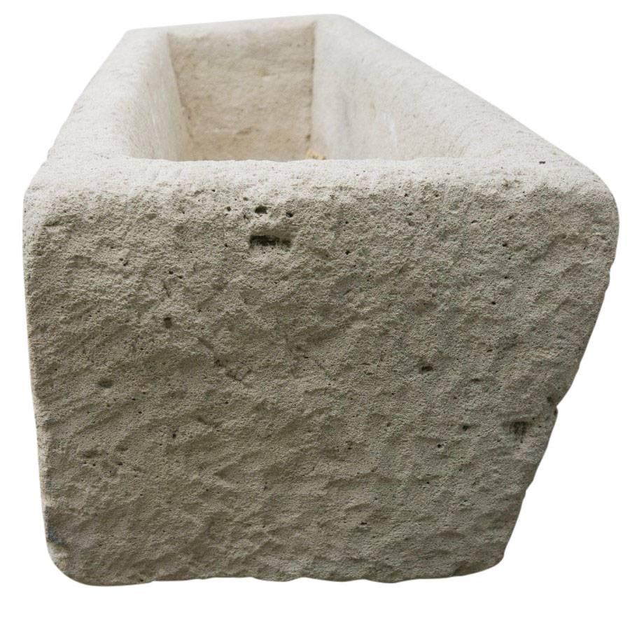 Carved circa 1900 in Java Indonesia and exported to California, this rectangular limestone trough is a substantial addition to your garden art design.

  
