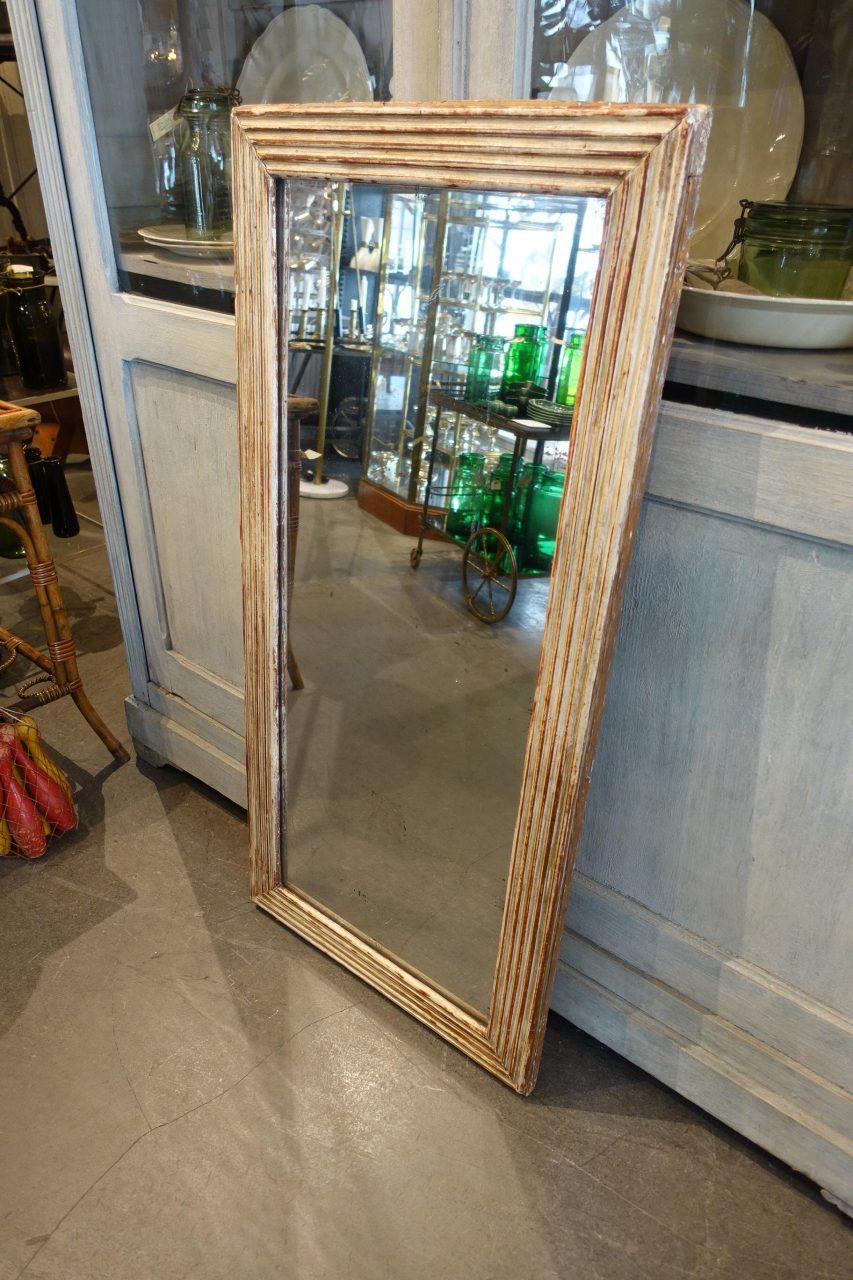 Wonderful antique rectangular mantelpiece mirror, with beautiful channeled frame, still with gilded remnants and beautiful original mercury mirror glass, giving a clear star-cut / diamond effect. Style wise attributed to the 1800s Directoire style,