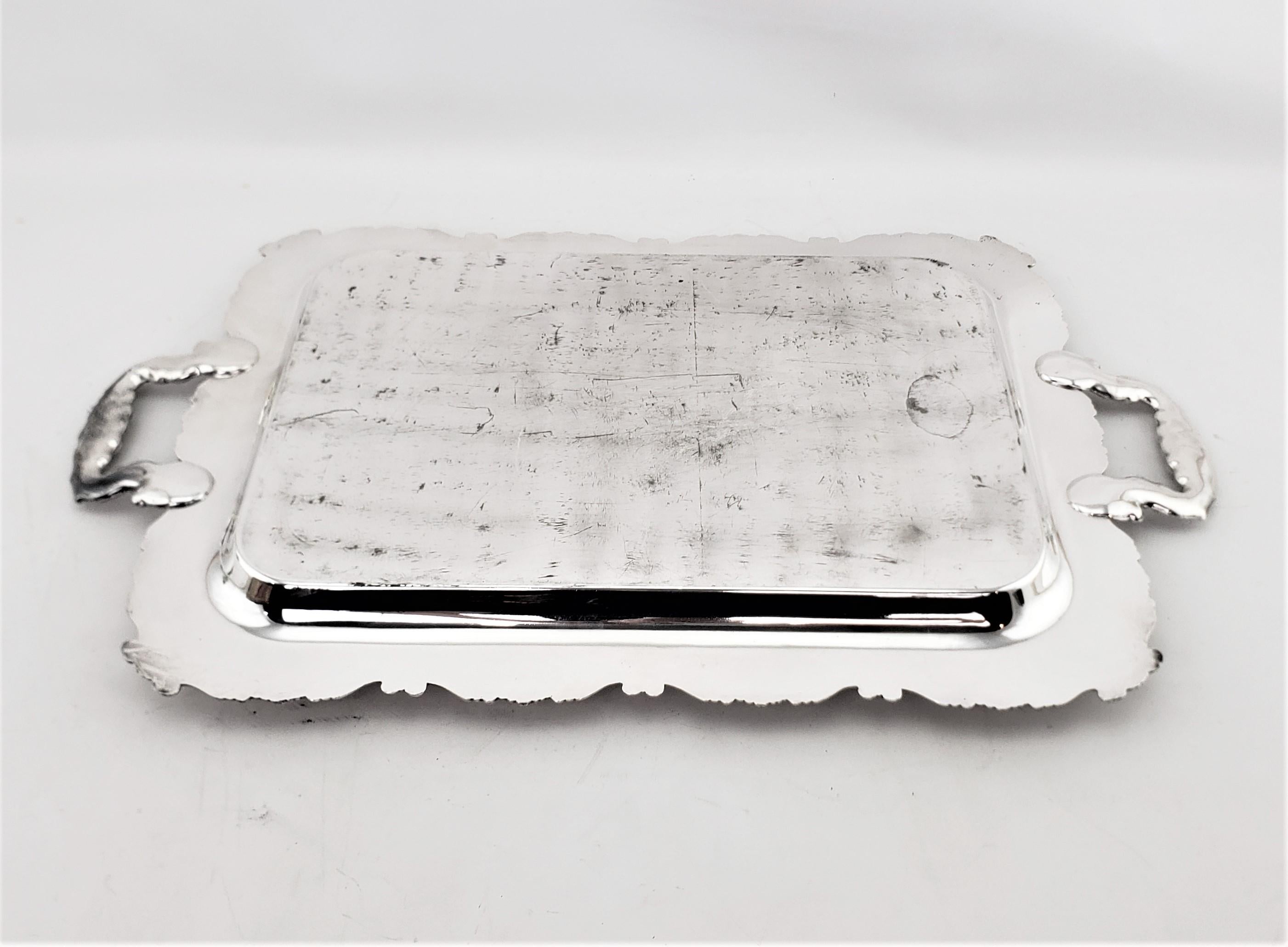 20th Century Antique Rectangular Silver Plated Serving Tray with Stylized Floral Decoration For Sale