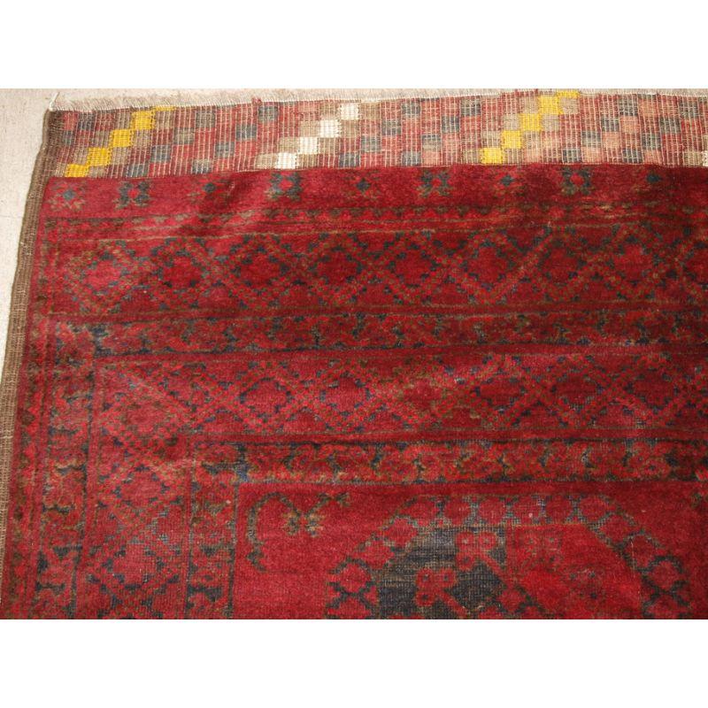 Turkish Antique Red Afghan Carpet with Traditional Ersari Design For Sale