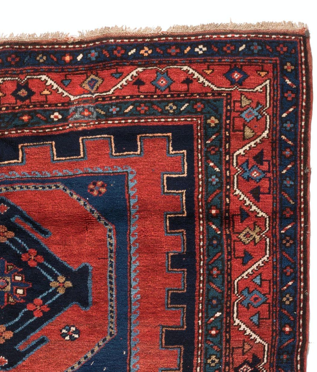 This lovely antique Caucasian Kazak carpet measures 4.7 x 7 ft and is from the 1930s.

 