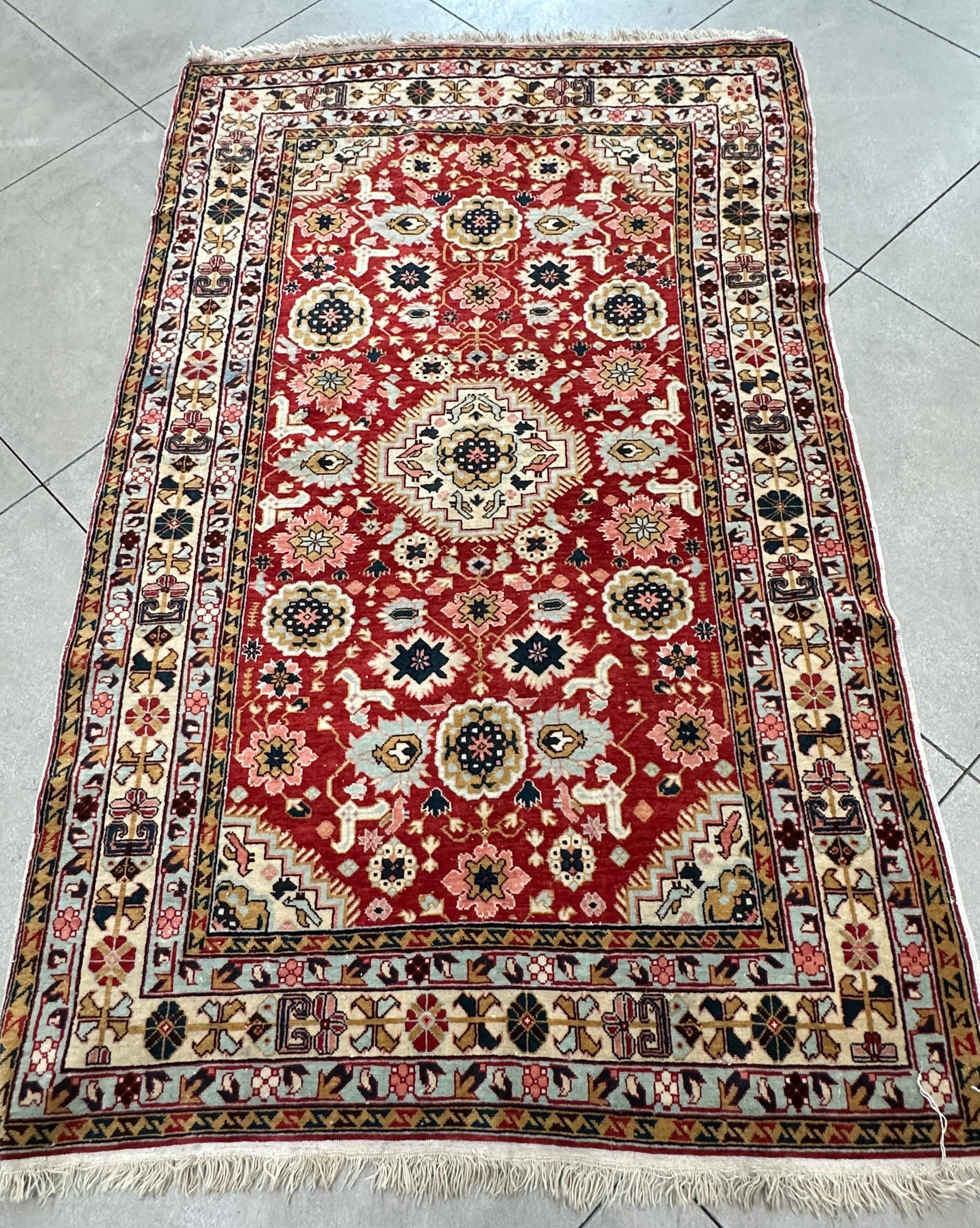 Transform your living space with the timeless charm and elegance of our Antique Red, Pale Blue, and Brown Accent Rug. This exquisite rug blends traditional craftsmanship with a sophisticated color palette, featuring intricate patterns and rich tones