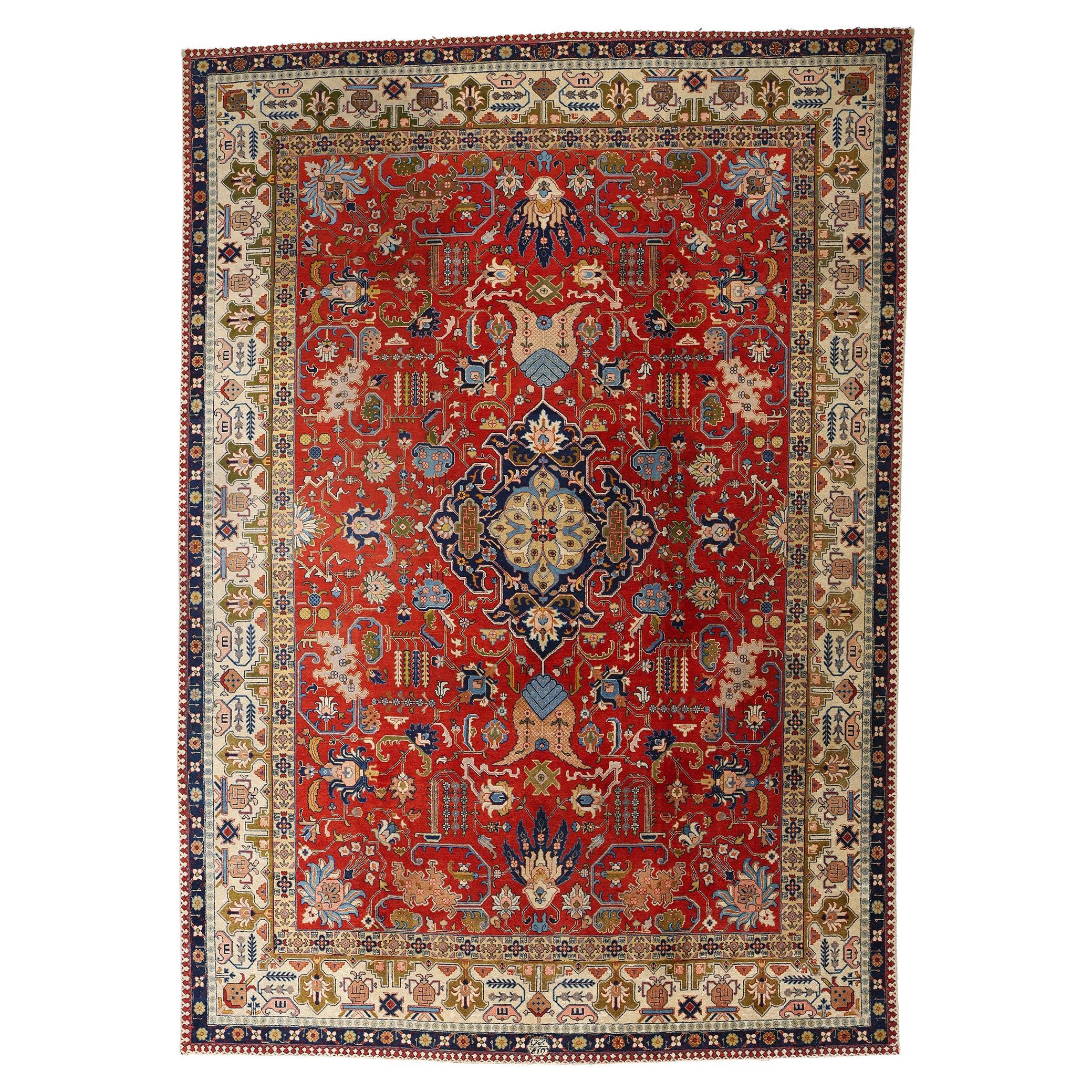 Tapis persan Tabriz antique rouge géométrique et botanique