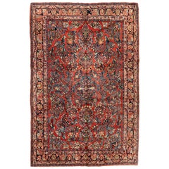 Antique tapis sarouk persan rouge or à fleurs:: taille de chambre:: circa 1920s