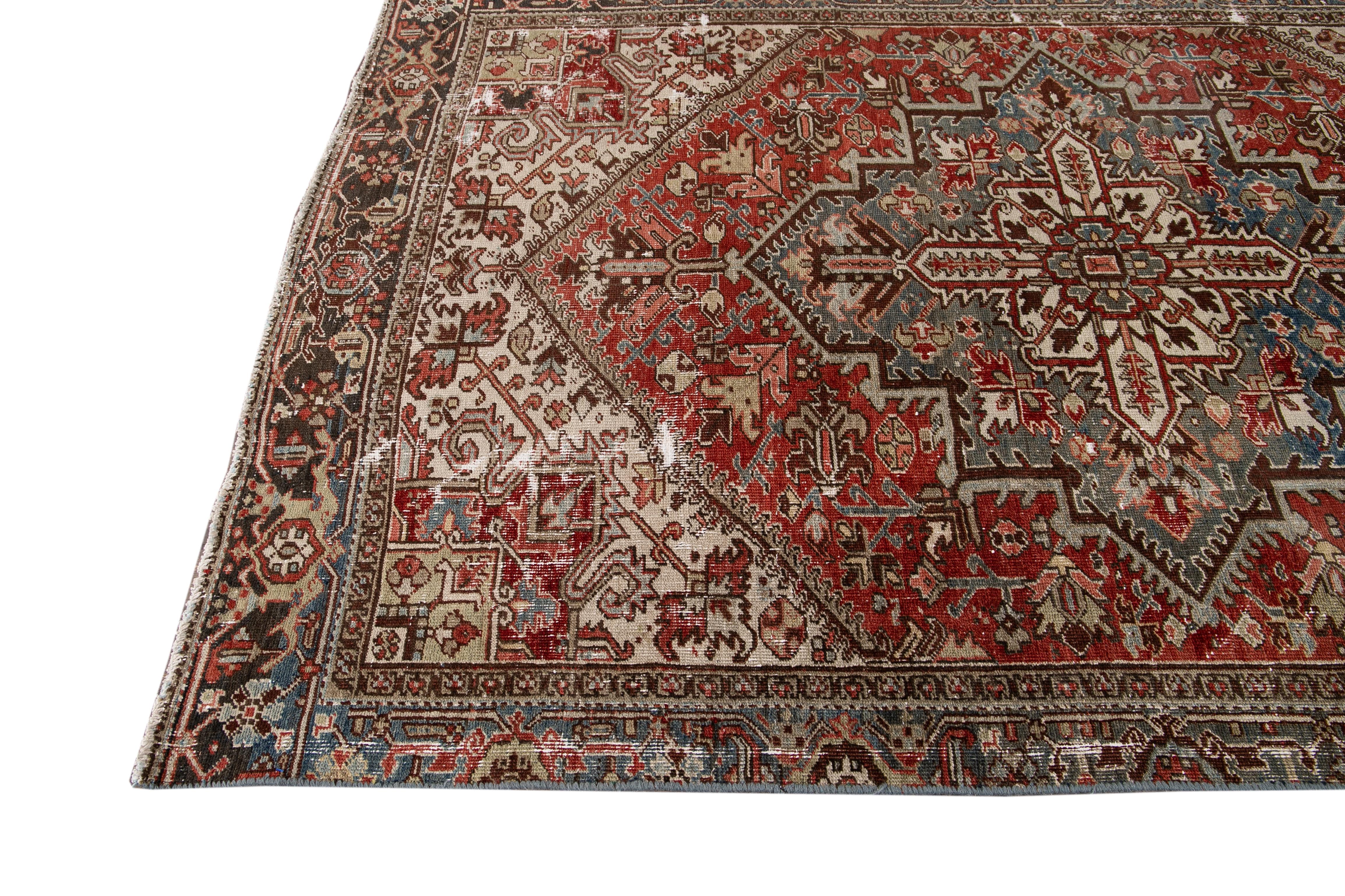 Persian Antique Red Heriz Handmade Medallion Floral Wool Rug For Sale